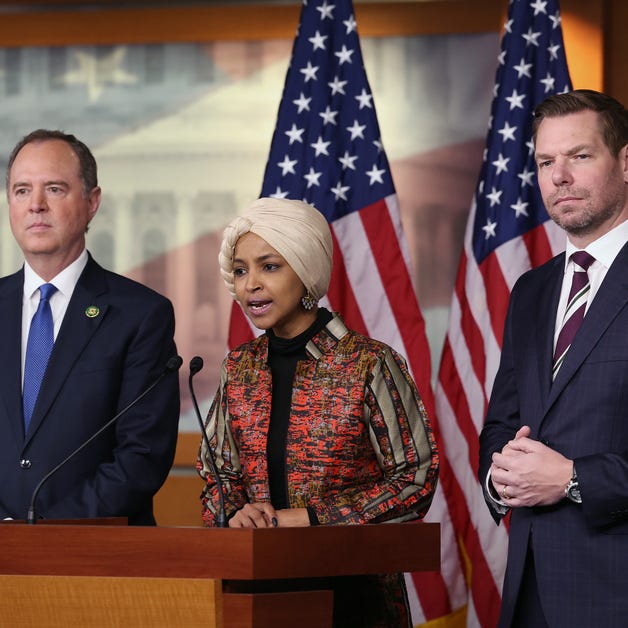 U.S. Rep. Ilhan Omar, D-Minn., (C), joined by Rep. Eric Swalwell, D-Calif., and Rep. Adam Schiff, D-Calif., speaks at a press conference on committee assignments for the 118th U.S. Congress, at the U.S. Capitol Building on January 25, 2023 in Washington, DC.