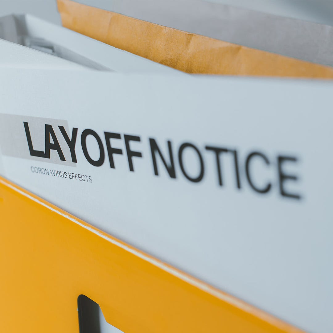 STOCK PHOTO: Layoff notice after spread of Covid-19. Crisis of the business recession during the Covid-19 outbreak.