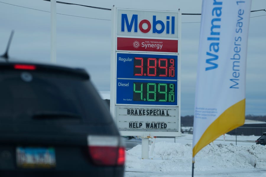 Gas prices are displayed at a Mobil gas station in Prospect Heights, Ill., Sunday, Jan. 29, 2023.