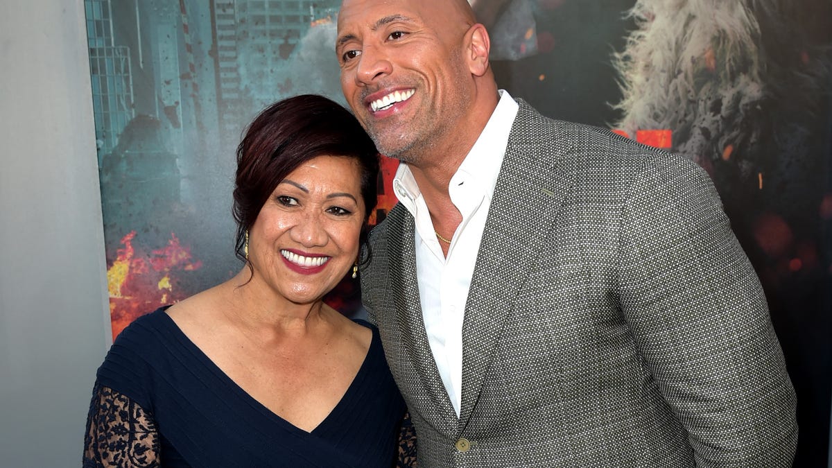 LOS ANGELES, CA - APRIL 04:  Actor Dwayne Johnson (R) and his mother Ata Johnson arrive at the premiere of Warner Bros. Pictures' "Rampage" at the Microsoft Theatre on April 4, 2018 in Los Angeles, California.  (Photo by Kevin Winter/Getty Images) ORG XMIT: 775148026 ORIG FILE ID: 942208780