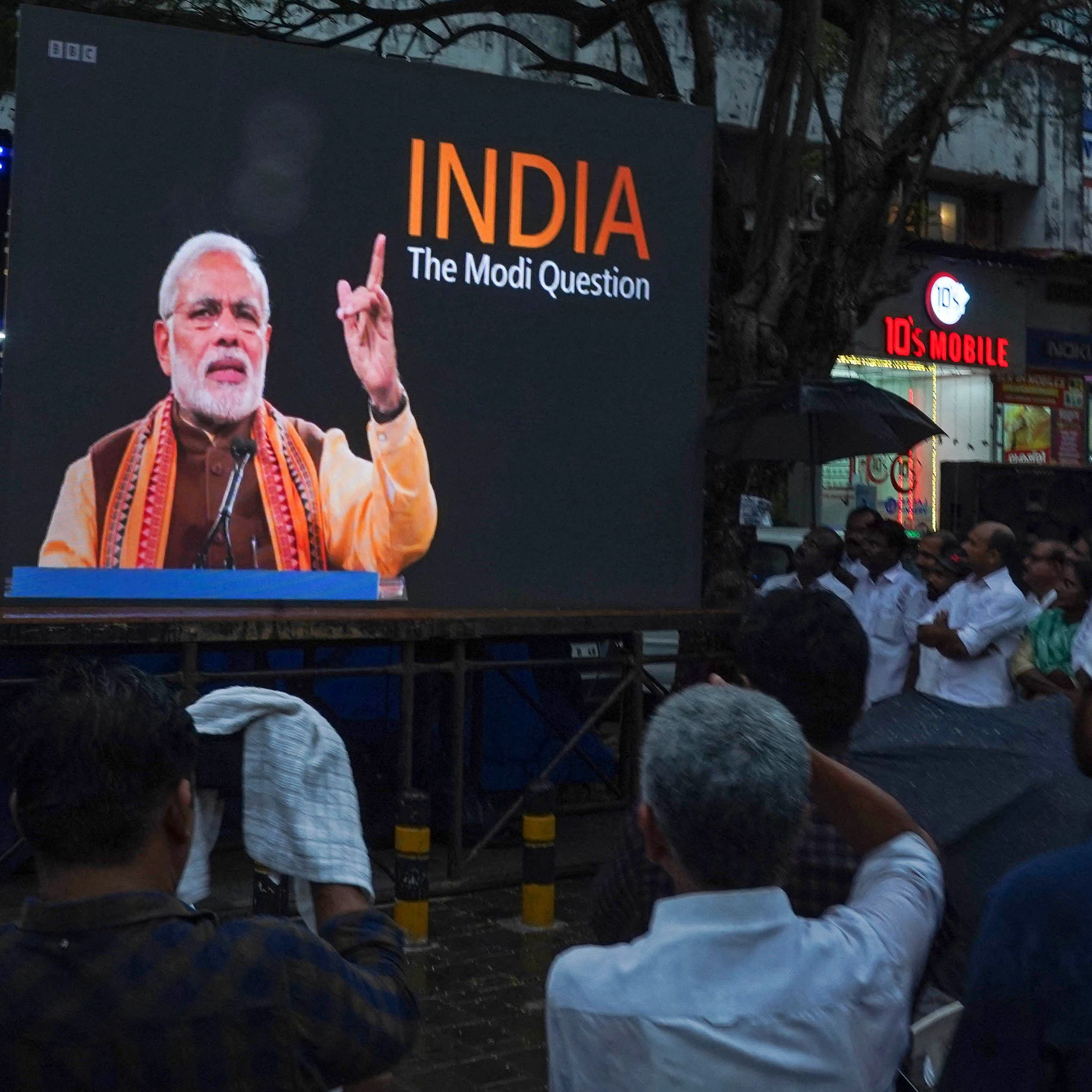 People watch the banned BBC documentary "India: The Modi Question" in Kochi on Jan. 24, 2023, on a screen installed under the direction of the district Congress committee.