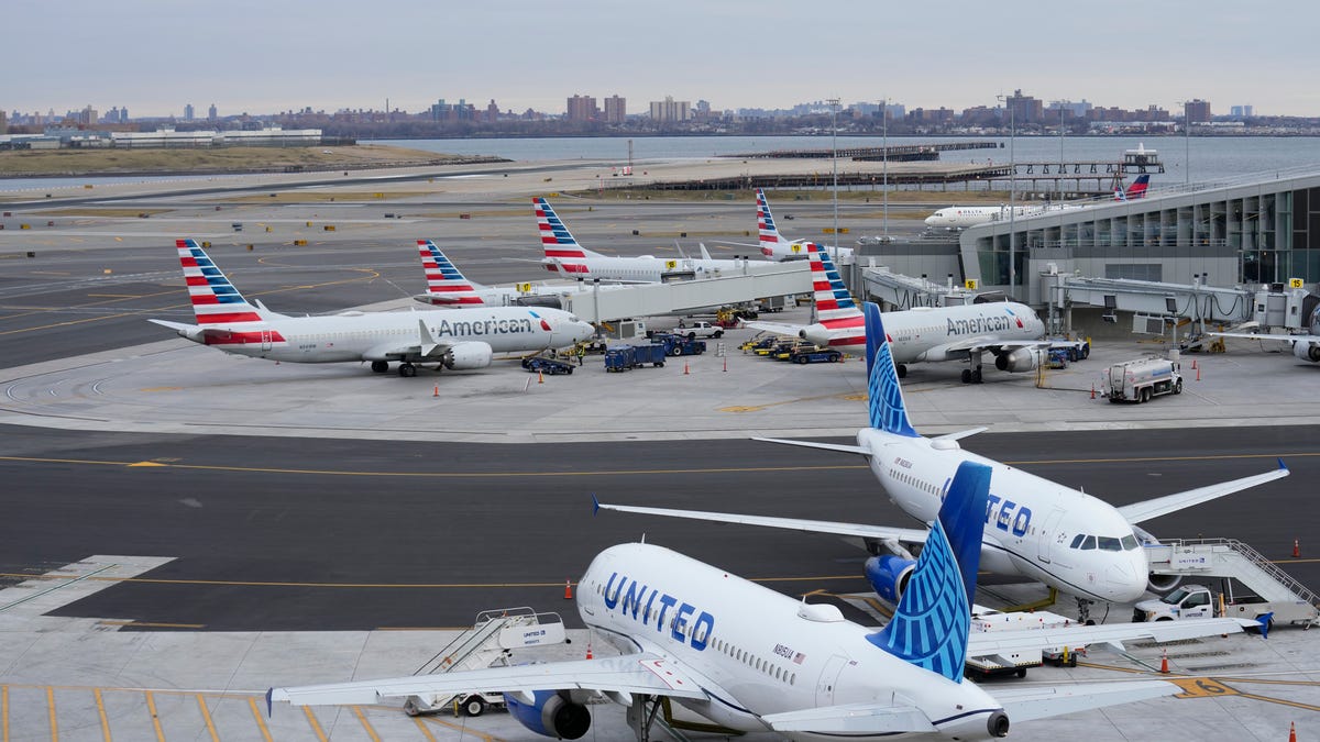 Planes sit on the tarmac at Terminal B at LaGuardia Airport in New York, Wednesday, Jan. 11, 2023.