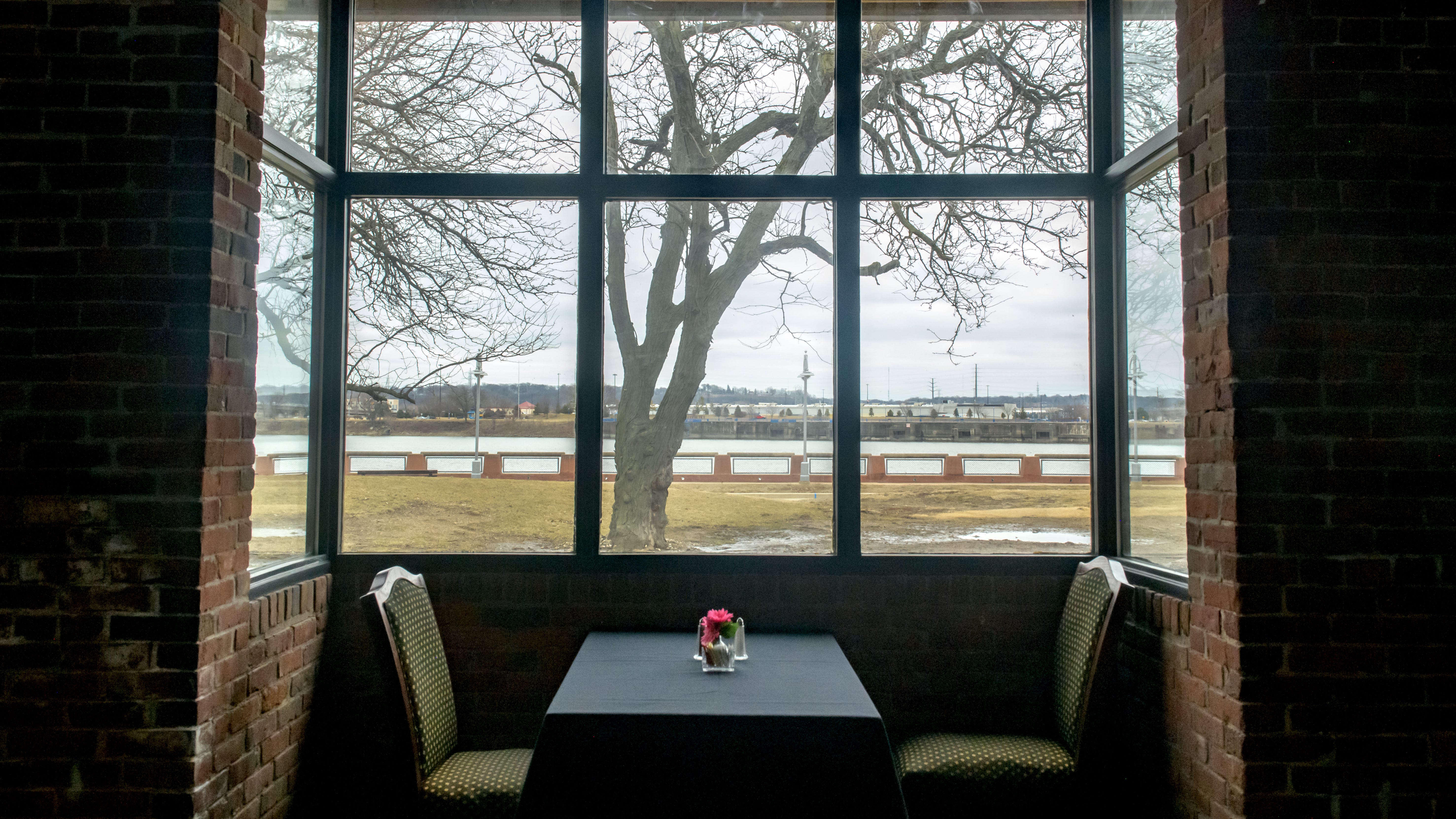 Patrons will get a view of the riverfront from a booth at the new location of the Creve Coeur Club at River Station in Peoria.