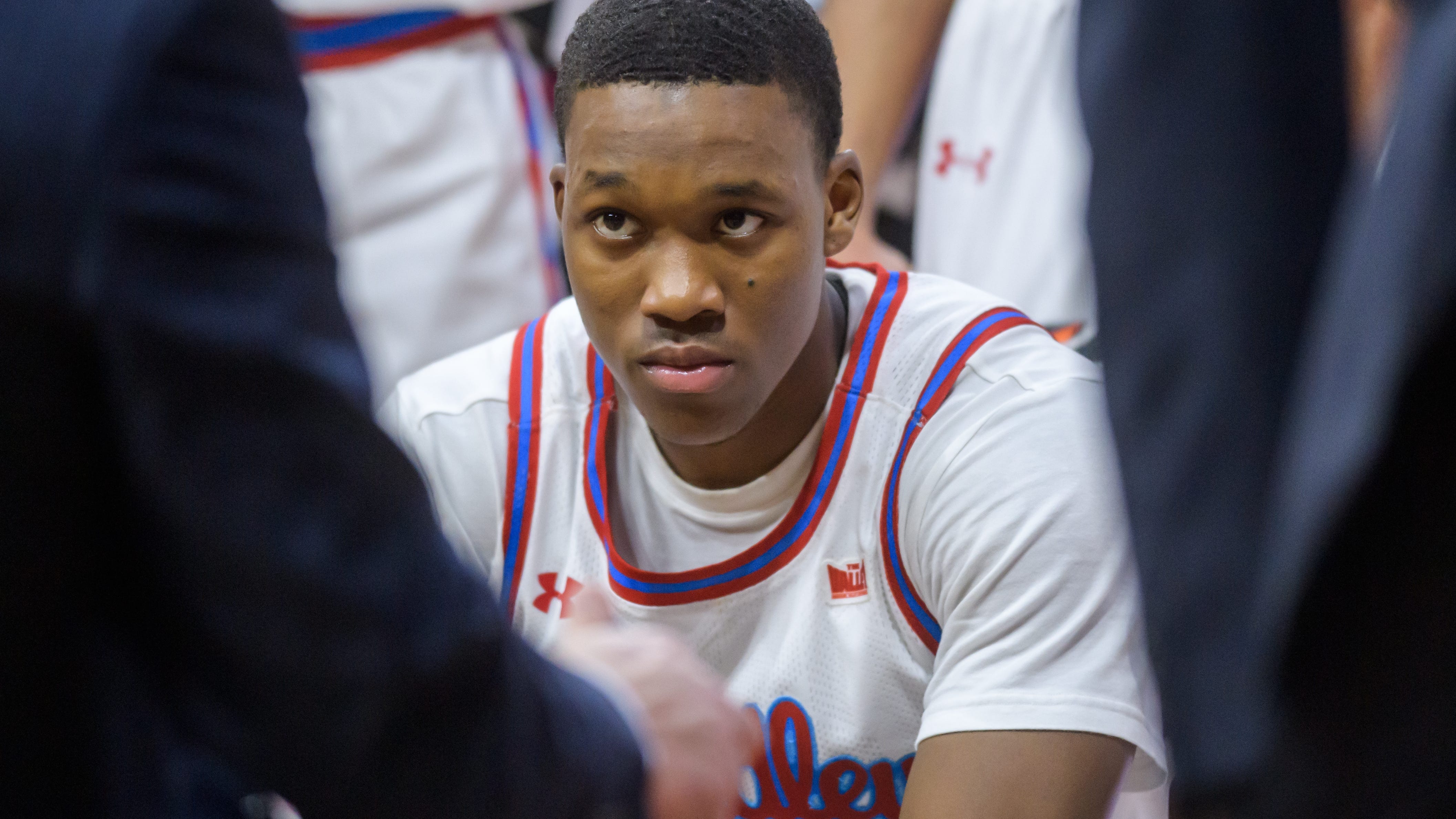 Bradley's Duke Deen listens intently to head coach Brian Wardle during a timeout in the second half Wednesday, Feb. 15, 2023 at Carver Arena. The Braves defeated the Missouri State Bears 64-54.