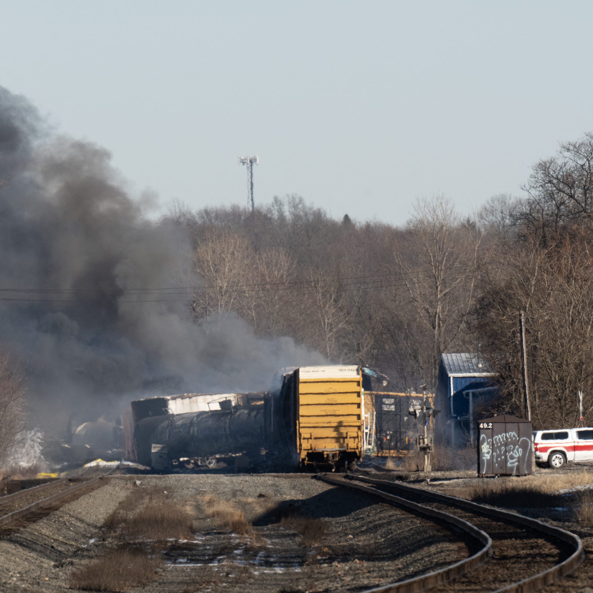 (FILES) In this file photo taken on February 04, 2023 smoke rises from a derailed cargo train in East Palestine, Ohio, on February 4, 2023. - The US government ordered the Norfolk Southern railroad company on February21, 2023 to pay the entire cost of the cleanup of a toxic train derailment in the midwestern state of Ohio. (Photo by DUSTIN FRANZ / AFP) (Photo by DUSTIN FRANZ/AFP via Getty Images) ORIG FILE ID: AFP_339Q8KK.jpg