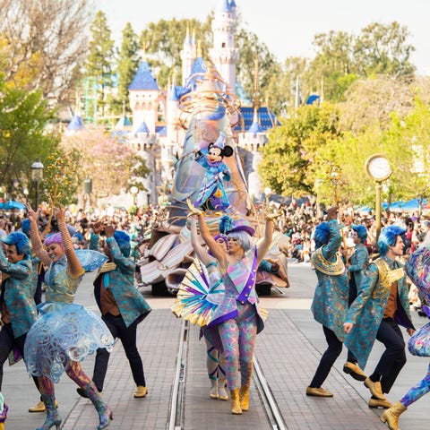 Sorcerer Mickey and color cast members help celebr