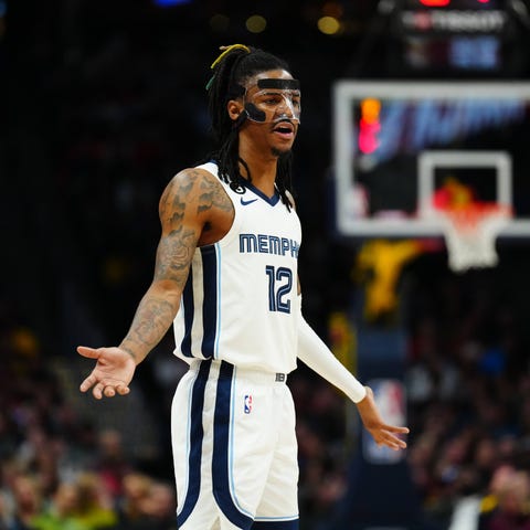 Memphis Grizzlies guard Ja Morant (12) reacts to a