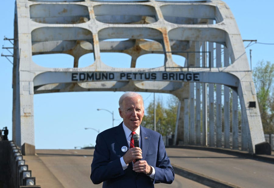 US President Joe Biden delivers remarks on the 58th anniversary of Bloody Sunday, at the Edmund Pettus Bridge in Selma, Alabama, on March 5, 2023. - More than 600 civil rights demonstrators were beaten by white police officers as they tried to cross the bridge during a 54 mile march from Selma to Montgomery, on March 7, 1965. (Photo by MANDEL NGAN/AFP via Getty Images)