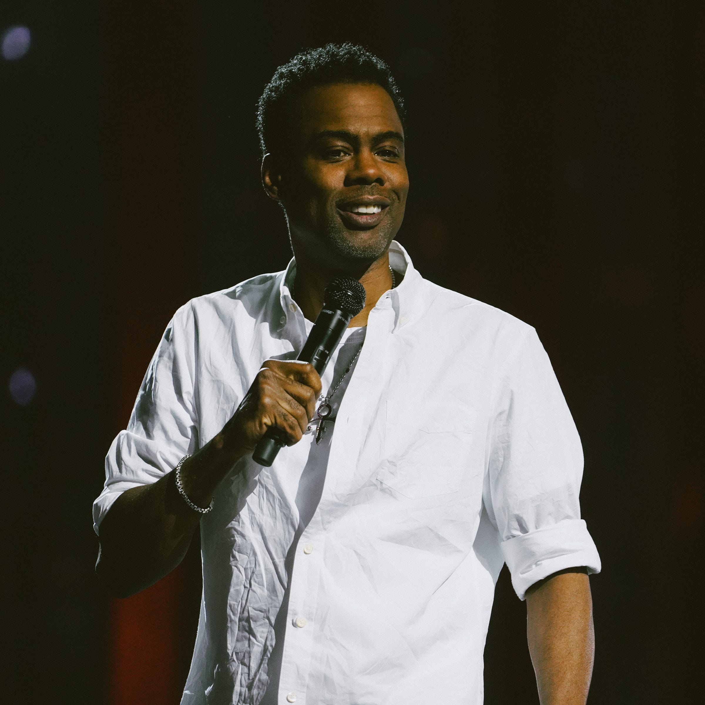 Chris Rock addresses the infamous Will Smith Oscars slap in "Selective Outrage," a live special streaming Saturday on Netflic from the Hippodrome Theater in Baltimore.