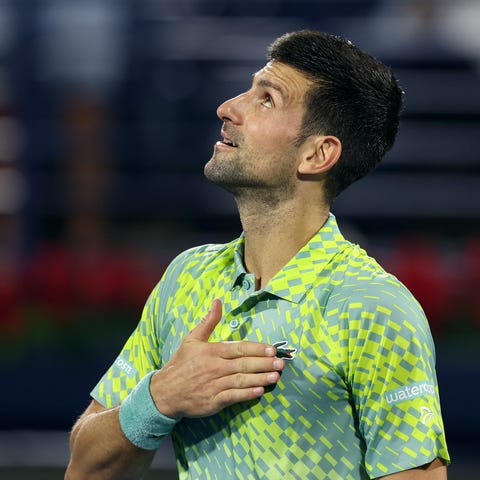 Novak Djokovic celebrates victory against Tallon G