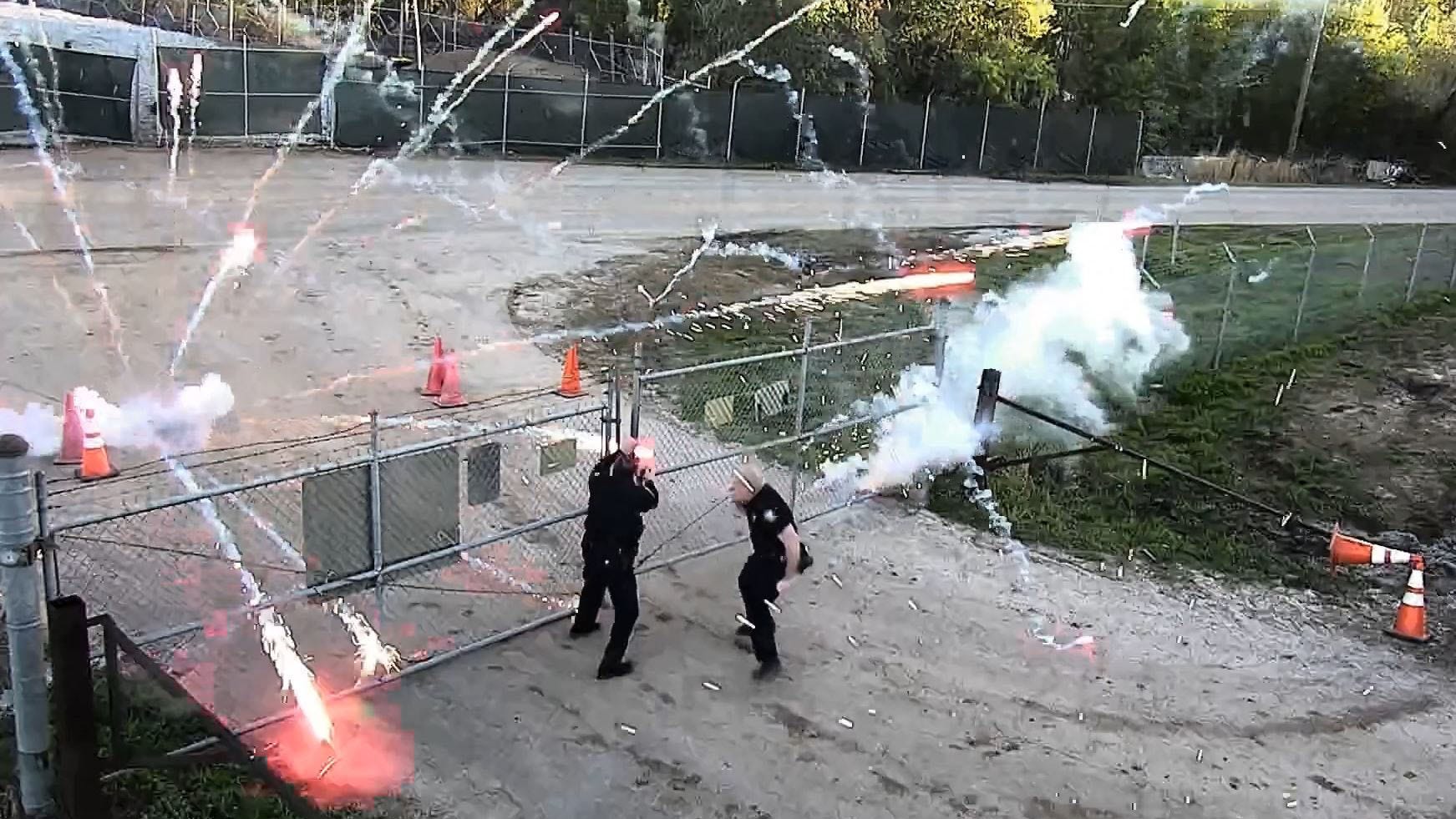 This screen grab taken from a video provided by the Atlanta Police Department shows protesters throwing bricks at a construction site in Atlanta on March 5, 2023.