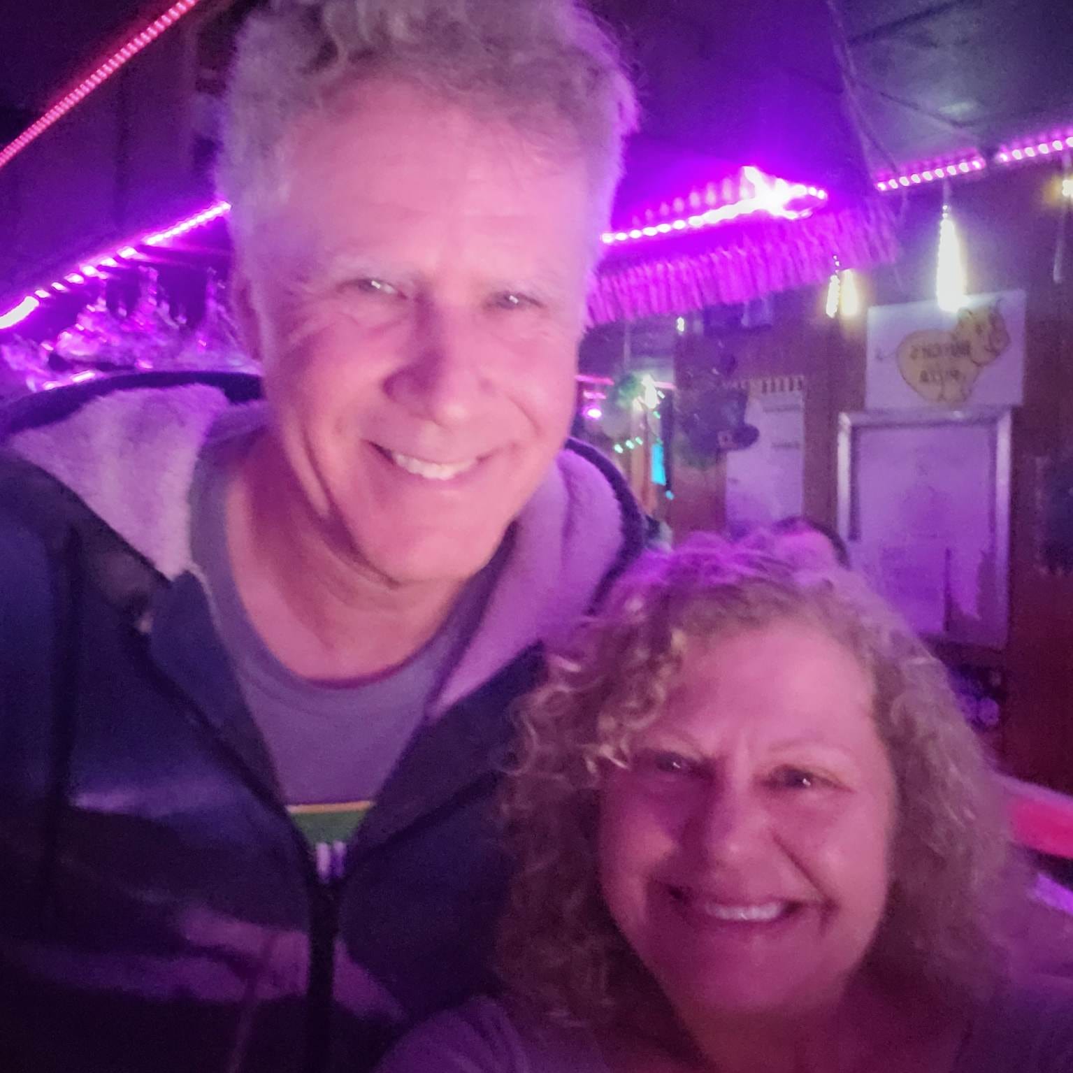 Dannette Wheeler Rumsey, owner of The Basket Case Pub in Peoria, poses for a photo with Will Ferrell.