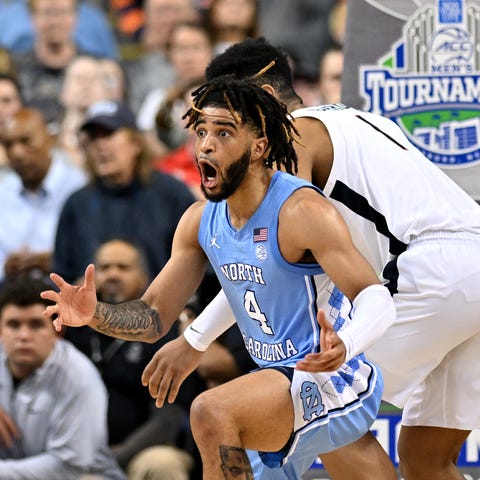 North Carolina's R.J. Davis reacts after being cal