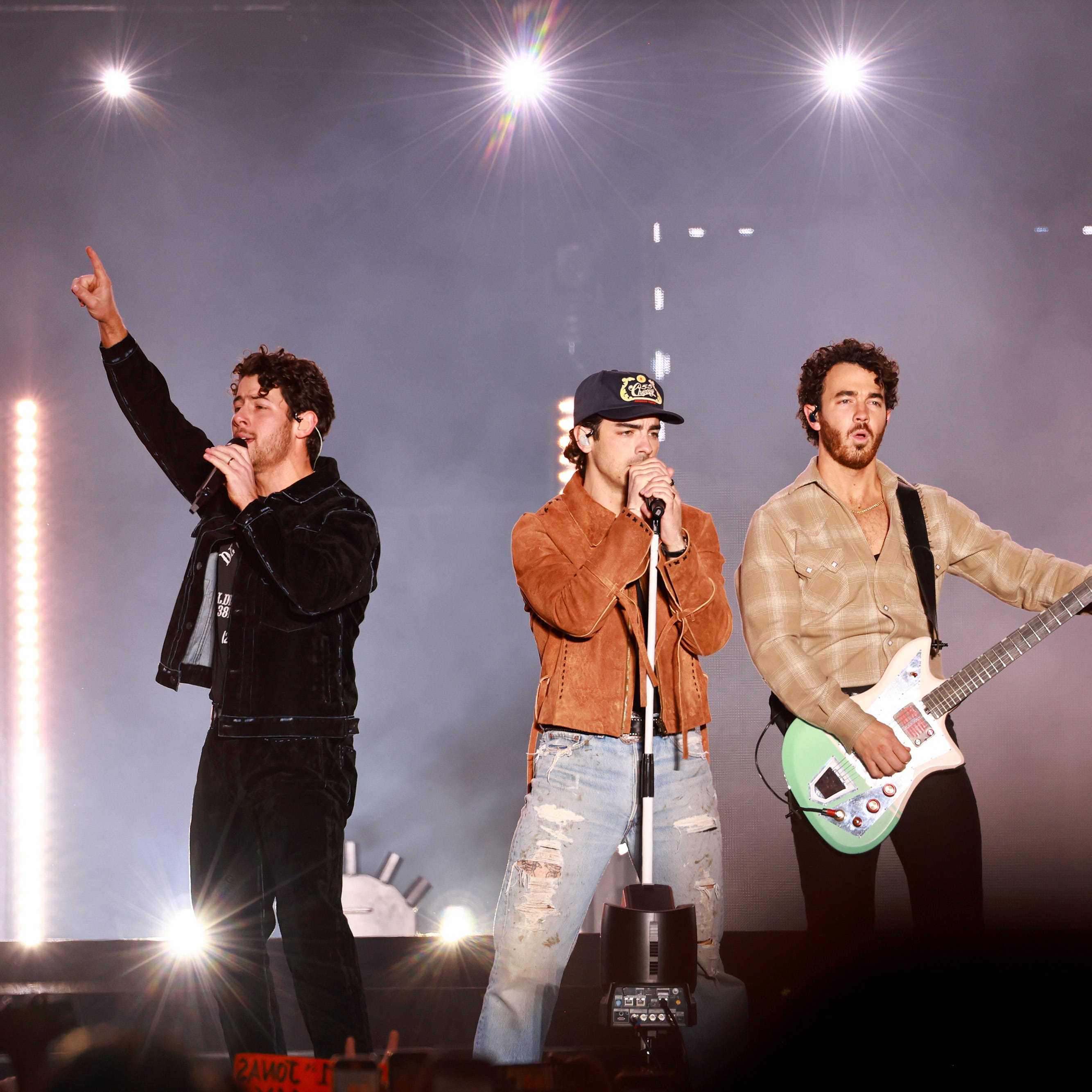 (L-R) Nick Jonas, Joe Jonas and Kevin Jonas of The Jonas Brothers performs onstage during AT&T Playoff Playlist Live at Banc of California Stadium on Jan. 7, 2023, in Los Angeles.