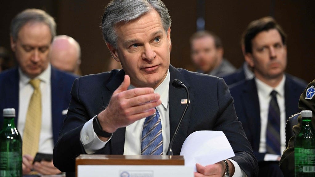 FBI Director Christopher Wray testifies during a Senate Intelligence Committee hearing on worldwide threats, in Washington, DC, on March 8, 2023.