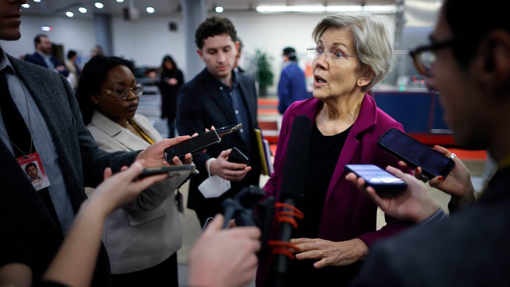 Sen. Elizabeth Warren, D-Mass., talks with reporters following the weekly Democratic Senate policy luncheon at the U.S. Capitol on March 15, 2023 in Washington, DC.