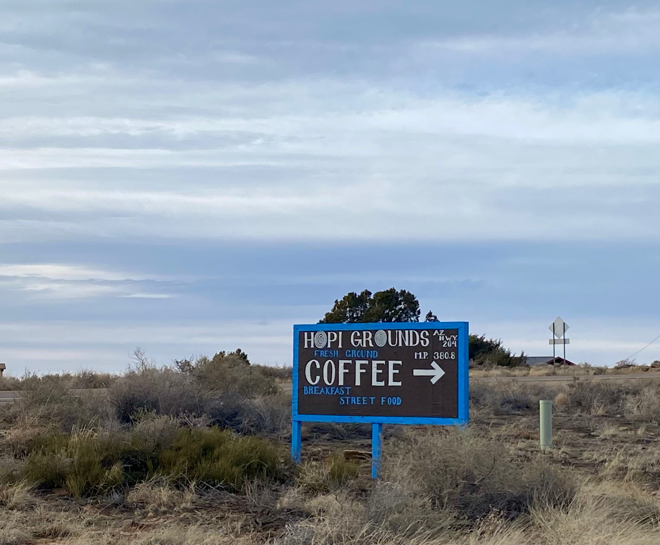 A sign points the way to Hopi Grounds, a small coffee shop on Second Mesa.