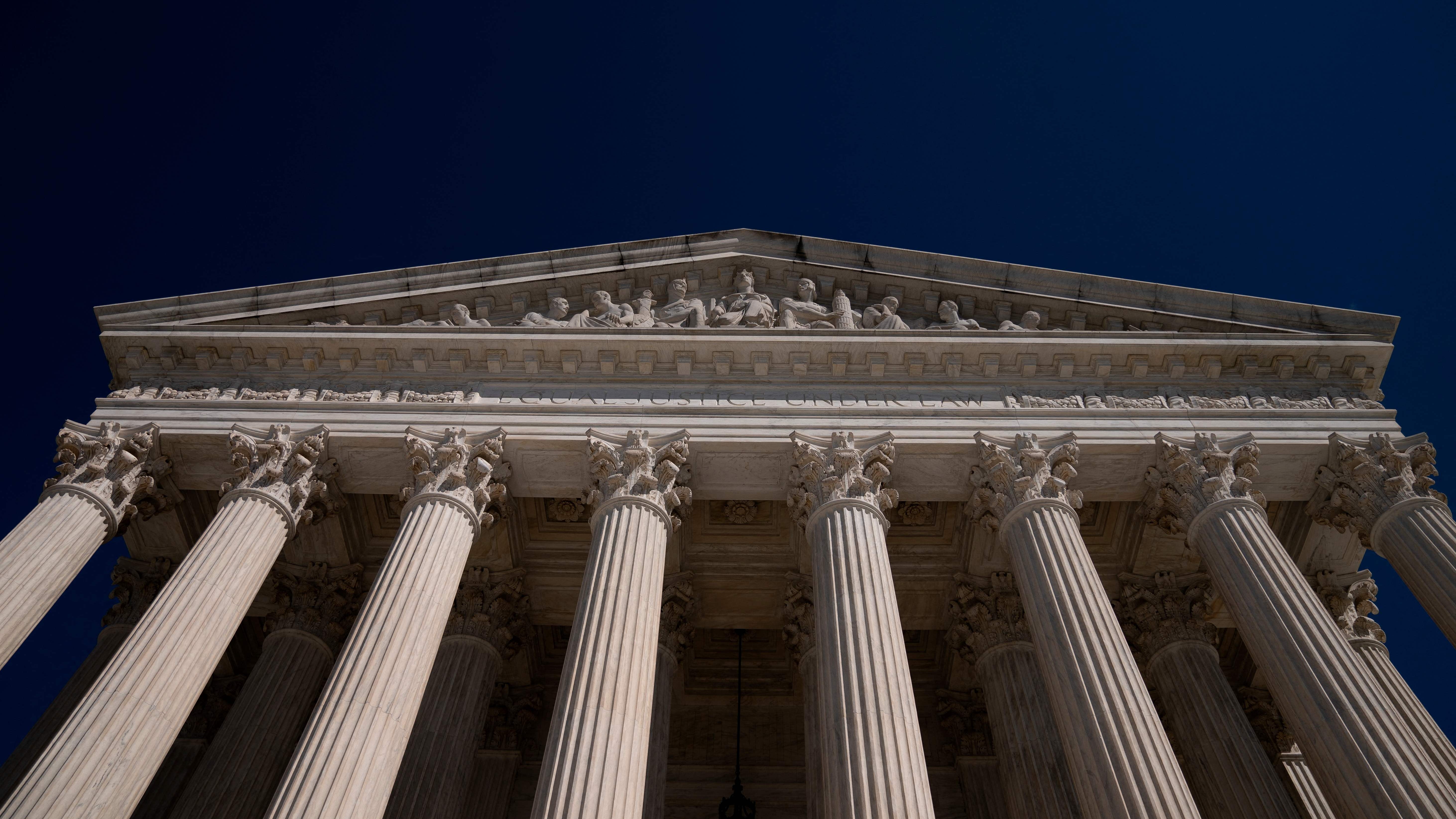 The US Supreme Court in Washington, DC, on March 22, 2023. - The Supreme Court today heard oral arguments in a trademark dispute between Jack Daniels and a dog toy manufacturer whose toy resembles the whiskey bottle. (Photo by Stefani Reynolds / AFP) (Photo by STEFANI REYNOLDS/AFP via Getty Images) ORIG FILE ID: AFP_33BV43L.jpg