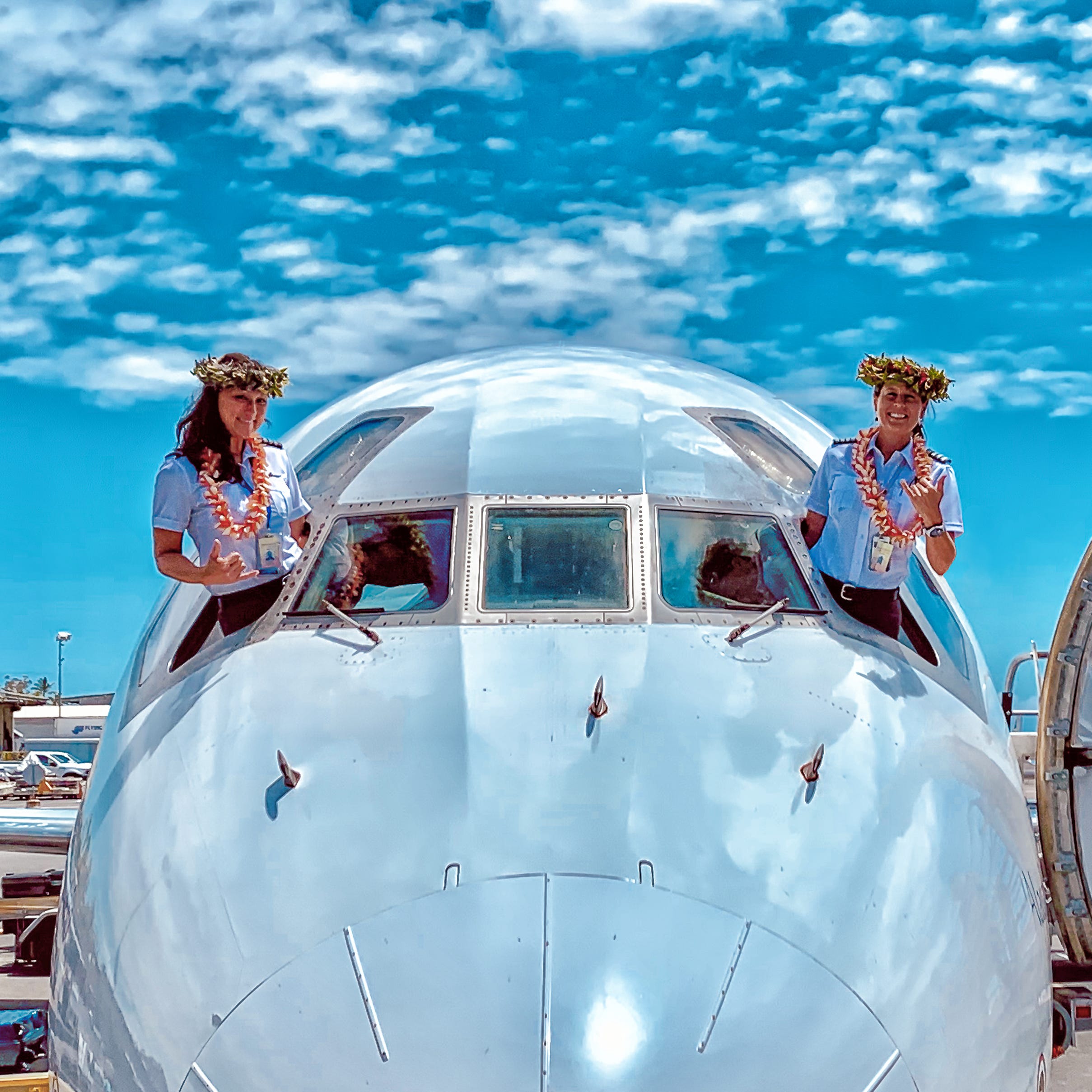 Mycynek and Mowat (left to right) flew to Tahiti together in 2019.