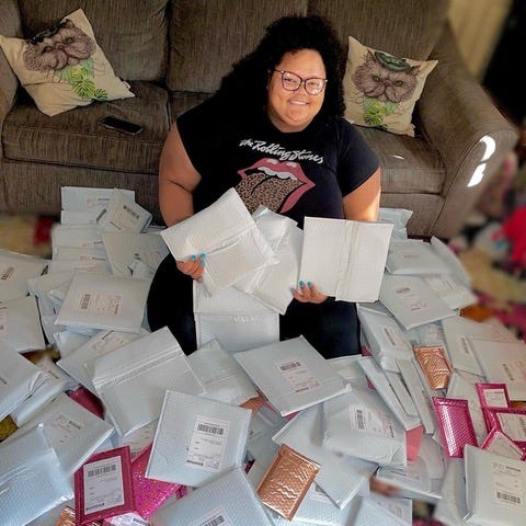 Jasmine Taylor, 31, who was nearly $80,000 in debt in January 2021. She used the cash stuffing method to save money, start a business and pay off this debt.