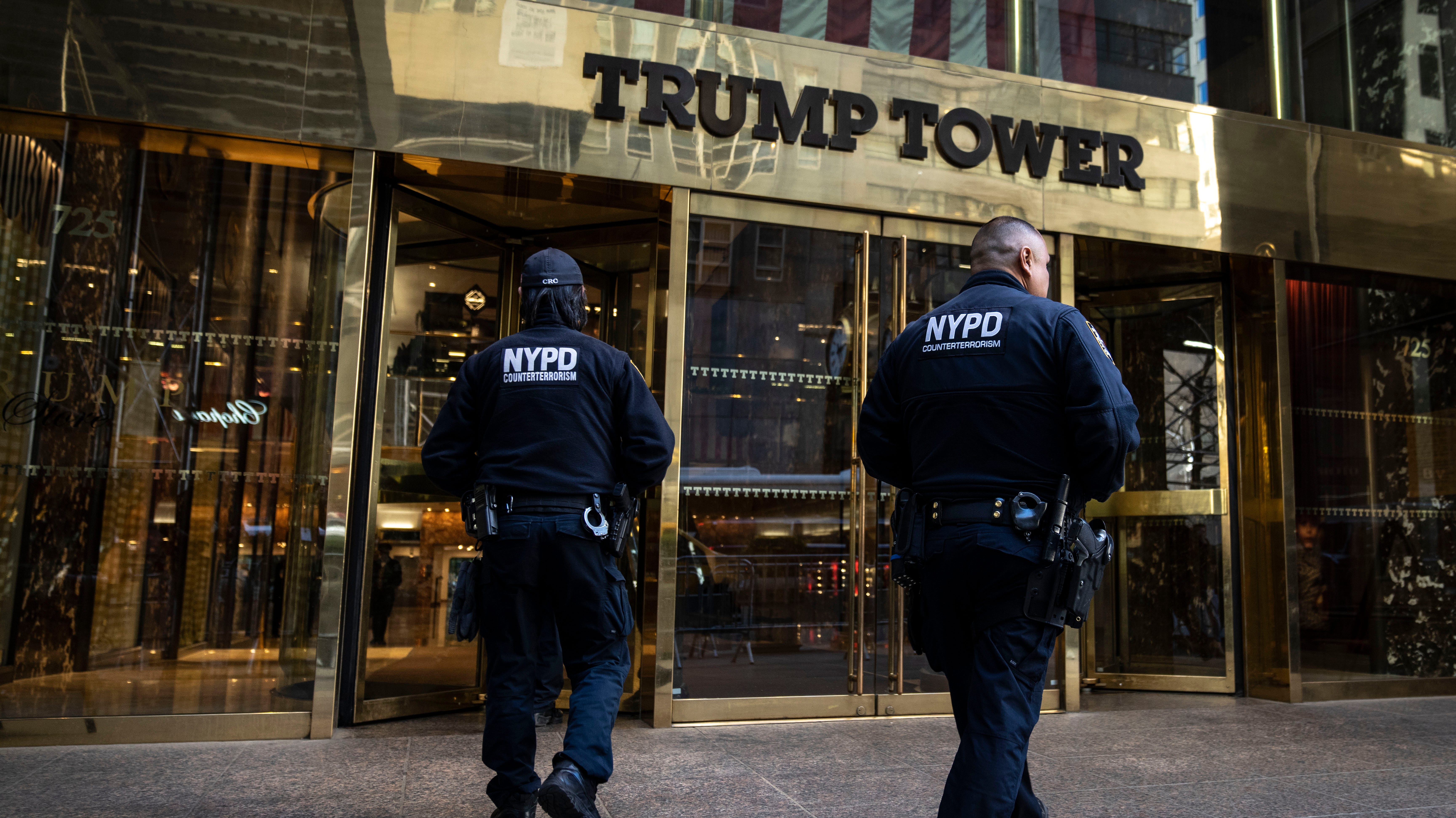 Counterterrorism police officers patrol outside Trump Tower on April 3, 2023, in New York City. Former President Donald Trump is scheduled to be arraigned the next day.