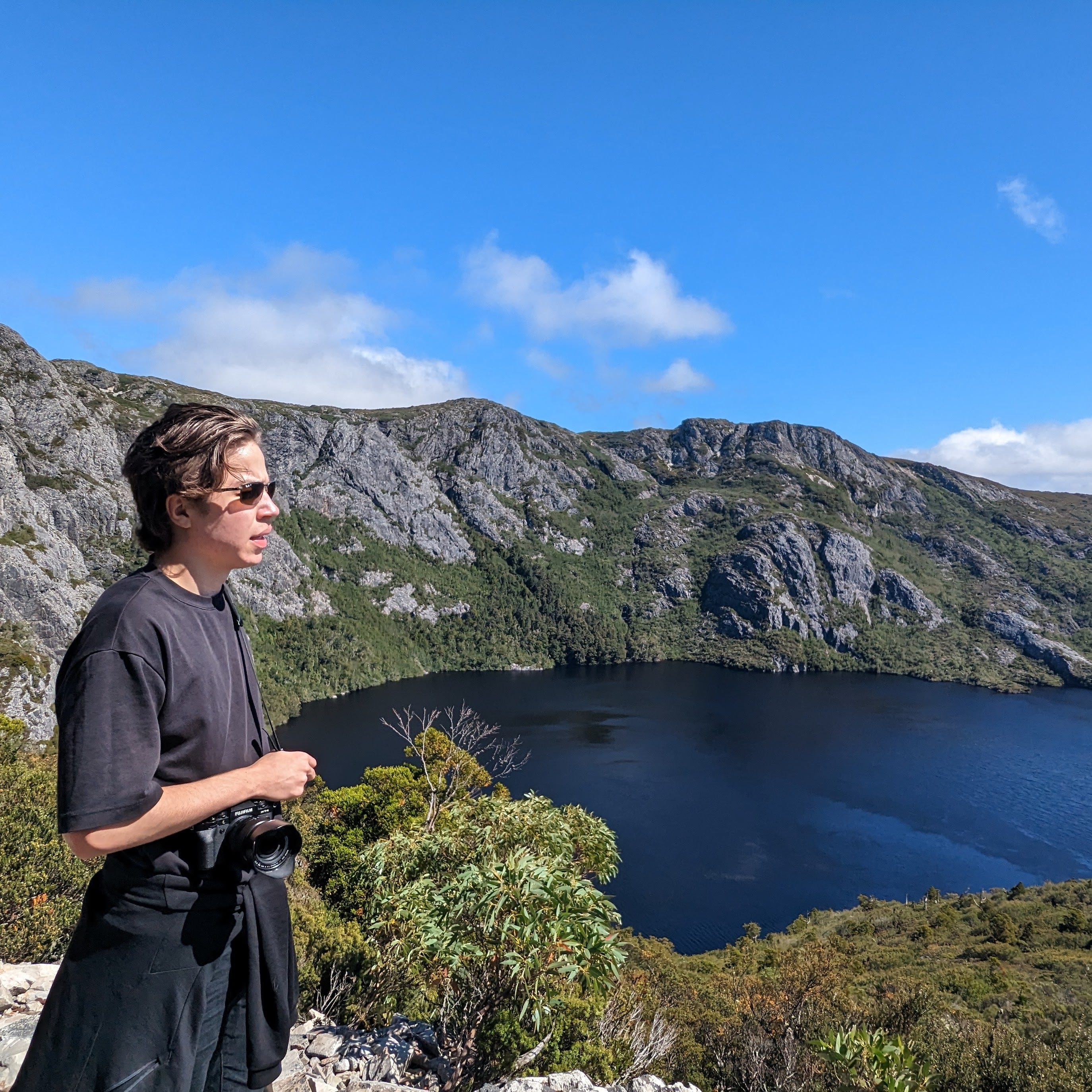 Photographer Iden Elliott at Cradle Mountain-Lake St Clair National Park in Tasmania, Australia.