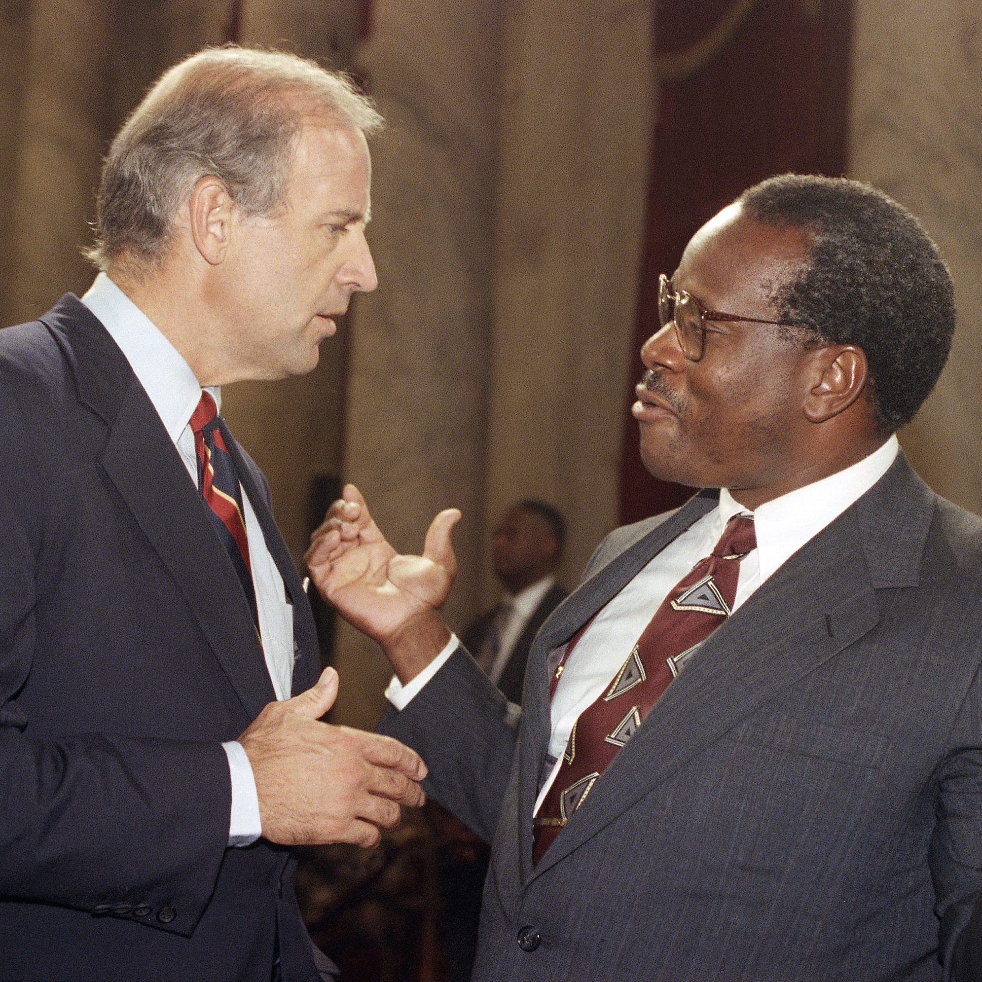 Supreme Court Justice Clarence Thomas gestures while talking with Sen. Joseph Biden, D-Del., chairman of the Senate Judiciary Committee, during a break in the committee?s nomination hearing for Thomas on Capitol Hill in Washington, Friday, Sept. 13, 1991.