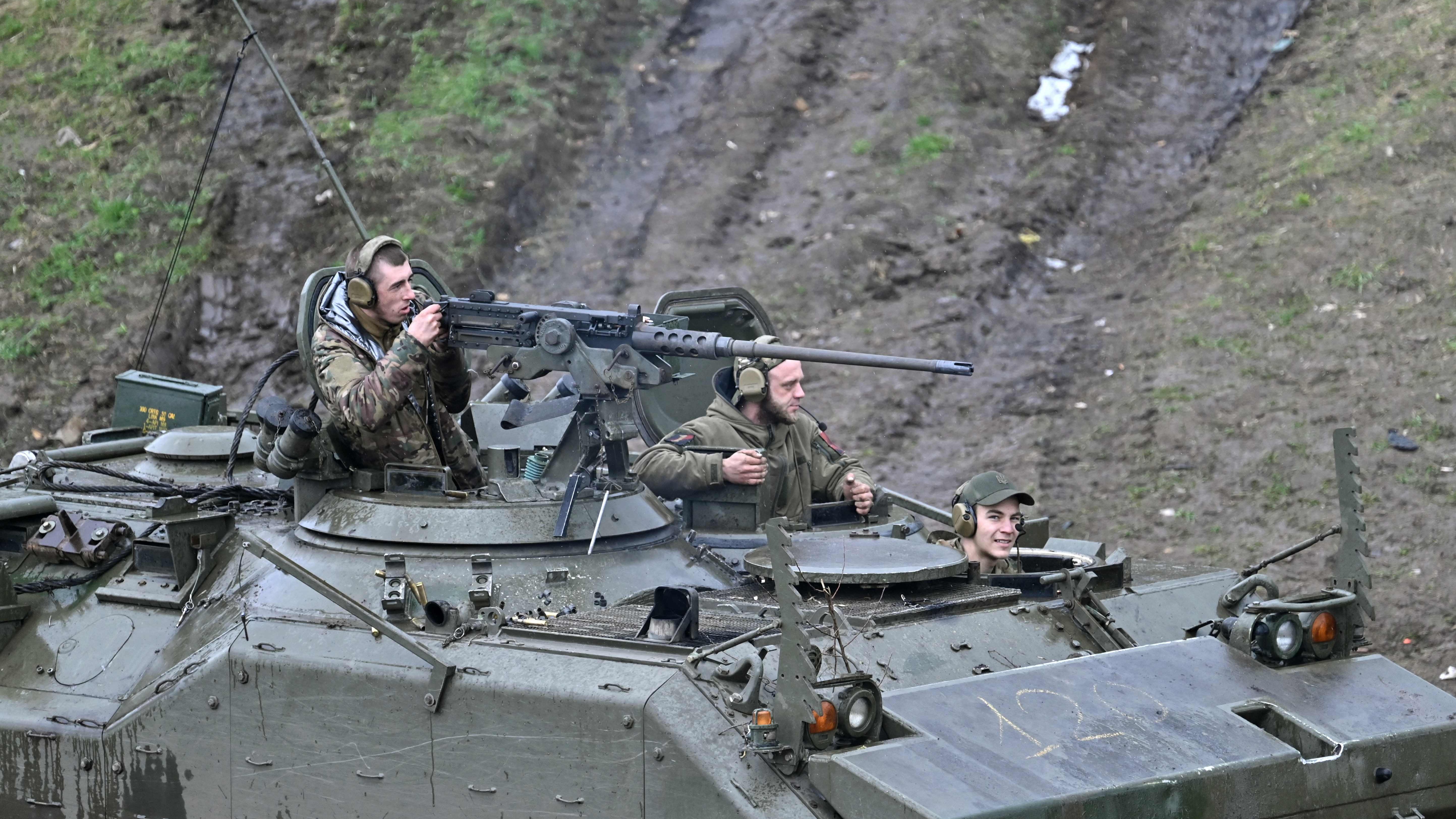 Ukrainian servicemen train in an armored personnel carrier (APC) during a training exercise in the Donetsk region on April 6, 2023, amid the Russian invasion of Ukraine.