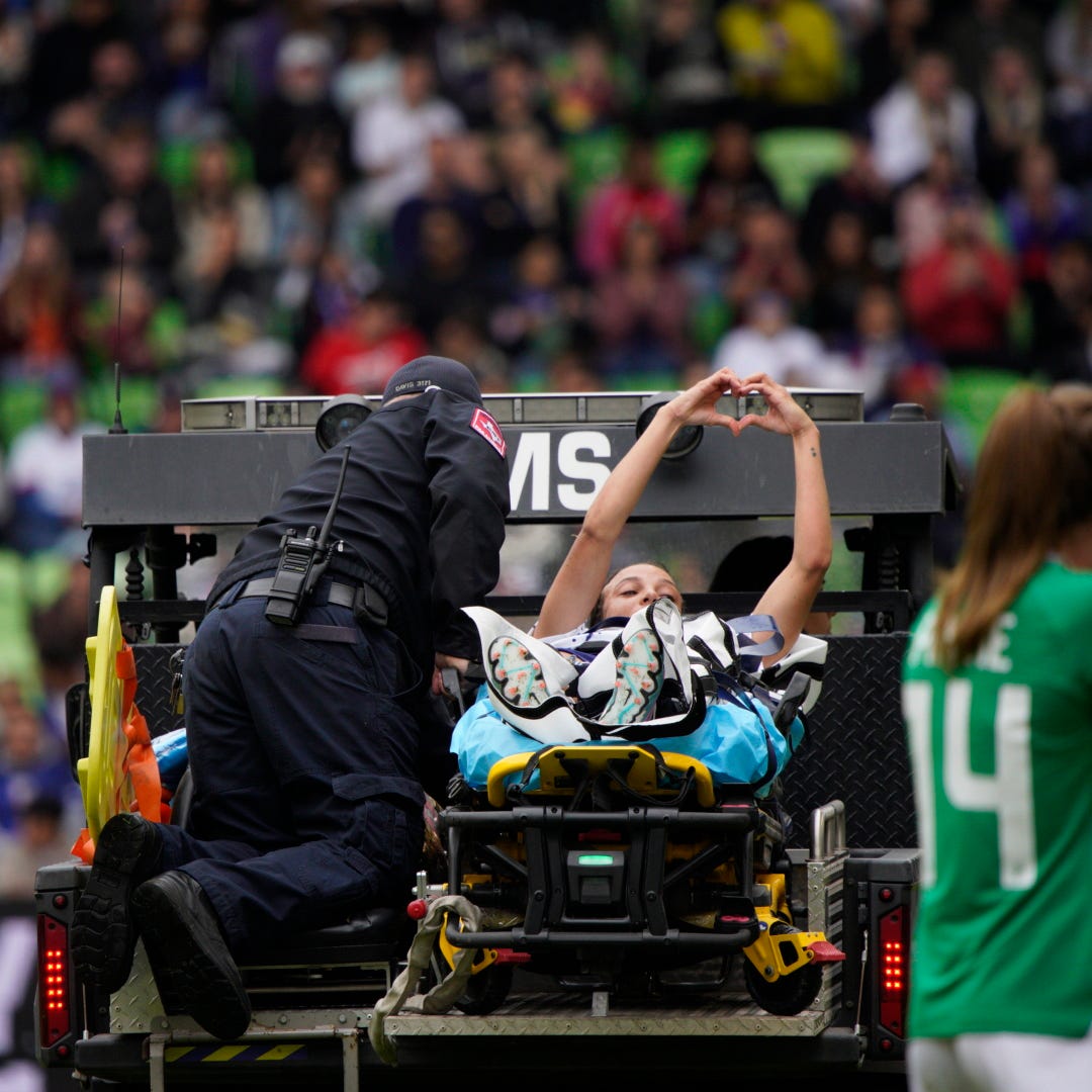 Apr 8, 2023; Austin, Texas, USA; U.S. Women's National Team forward Mallory Swanson (9) is escorted off field by medical personnel during the first half in a match against the Republic of Ireland Women's National Team at Q2 Stadium.