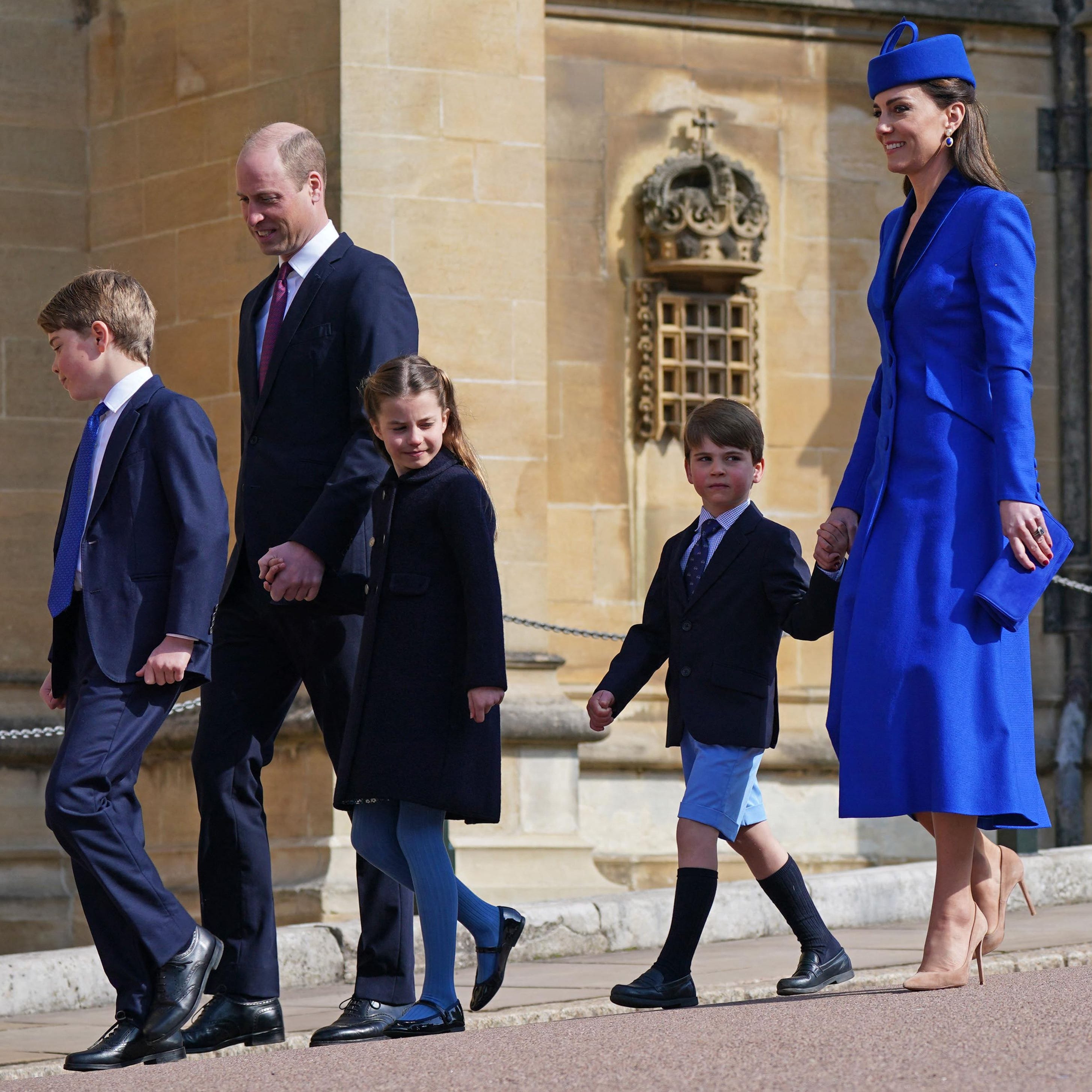 Britain's Prince William, Prince of Wales (2L), Britain's Prince George of Wales (L), Britain's Catherine, Princess of Wales (R), Britain's Princess Charlotte of Wales (C) and Britain's Prince Louis of Wales arrive for the Easter Mattins Service at St. George's Chapel, Windsor Castle on April 9, 2023. (Photo by Yui Mok / POOL / AFP) (Photo by YUI MOK/POOL/AFP via Getty Images) ORIG FILE ID: AFP_33CW6PB.jpg