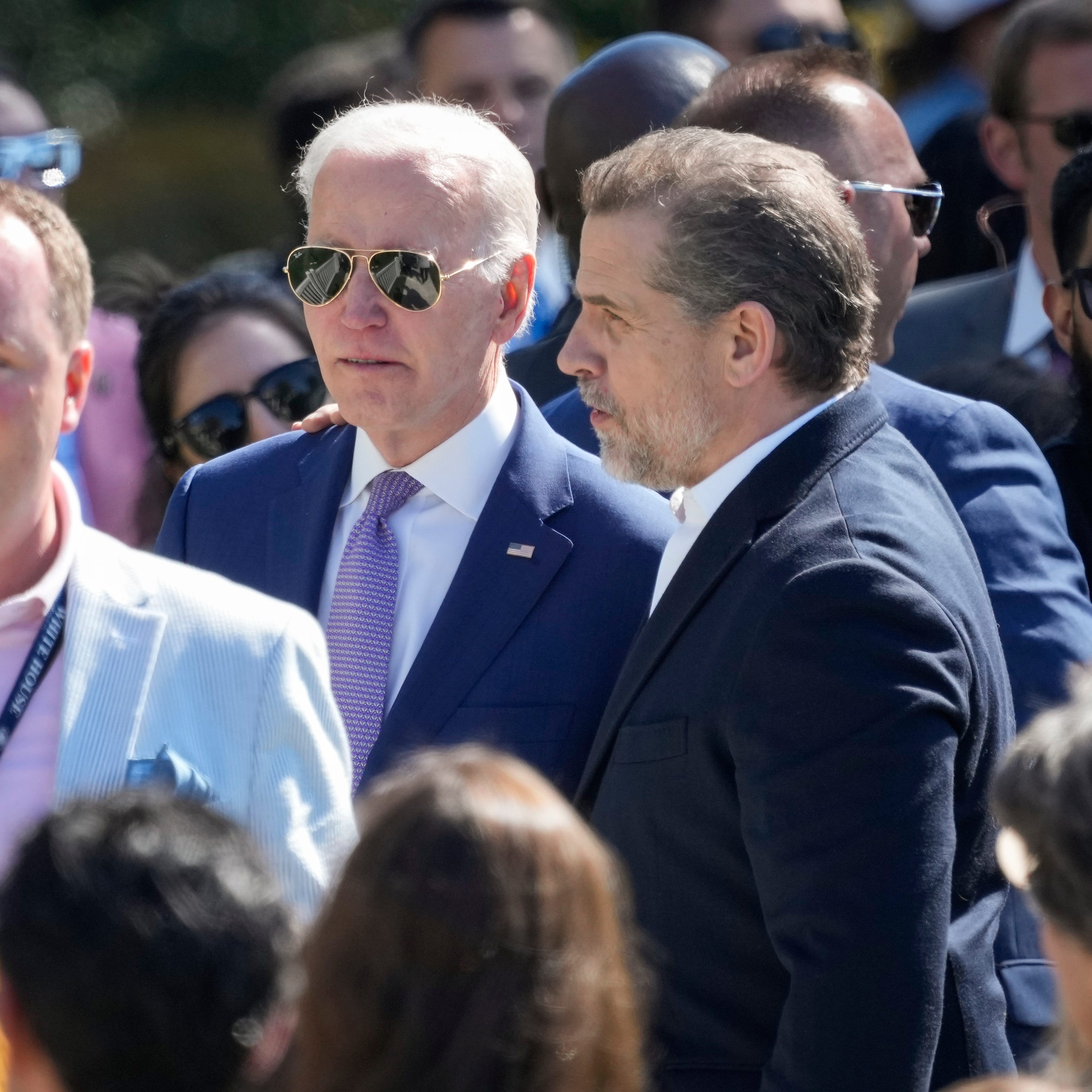 Hunter Biden, right, meets and speaks with his father President Joe Biden, and proceeds to walk back inside of the White House after the President and First lady Jill Biden welcomed and greeted people at the annual Easter Egg Roll on Monday, April 10, 2023.