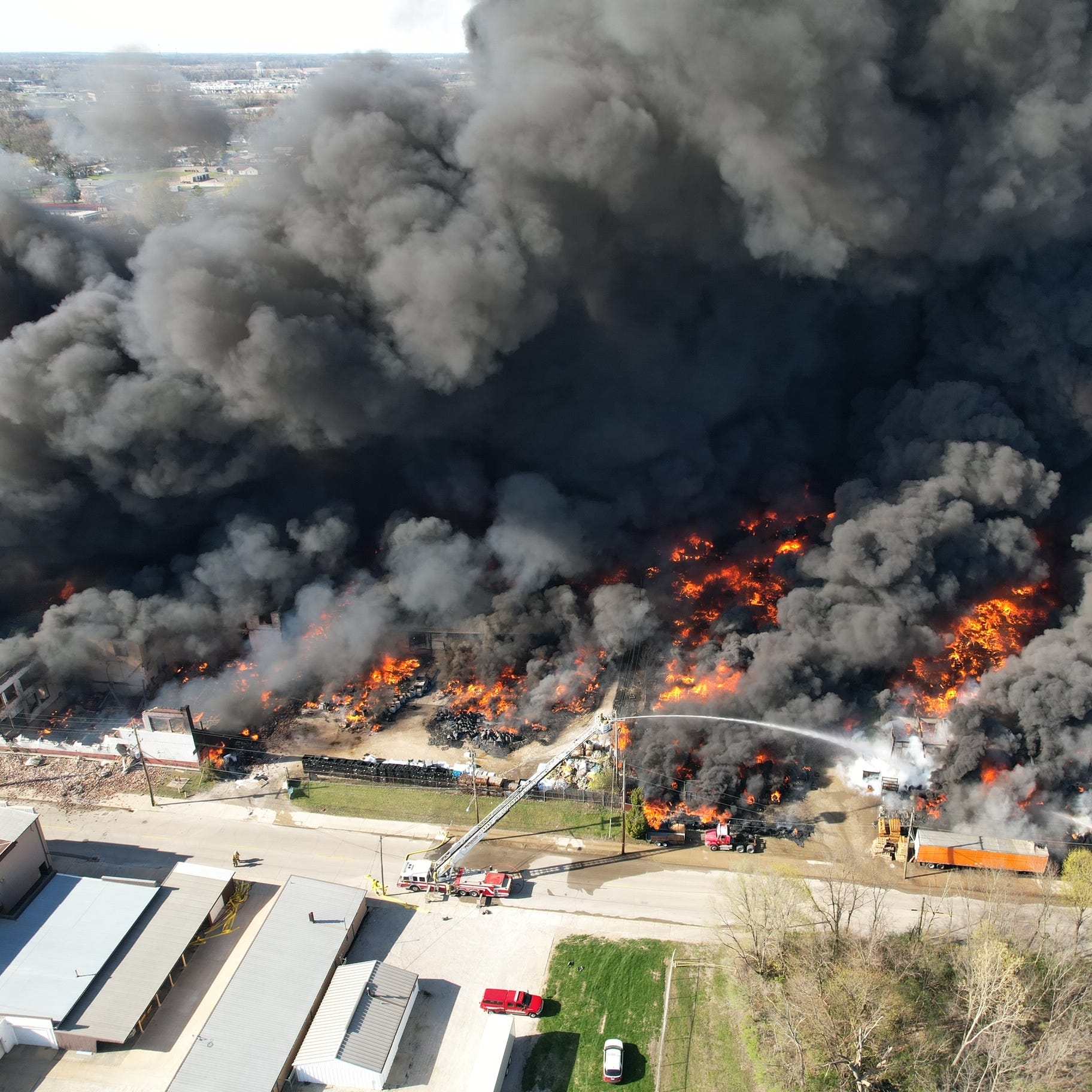 Smoke rises from an industrial fire April 11, 2023, at 358 NW F St. in Richmond.