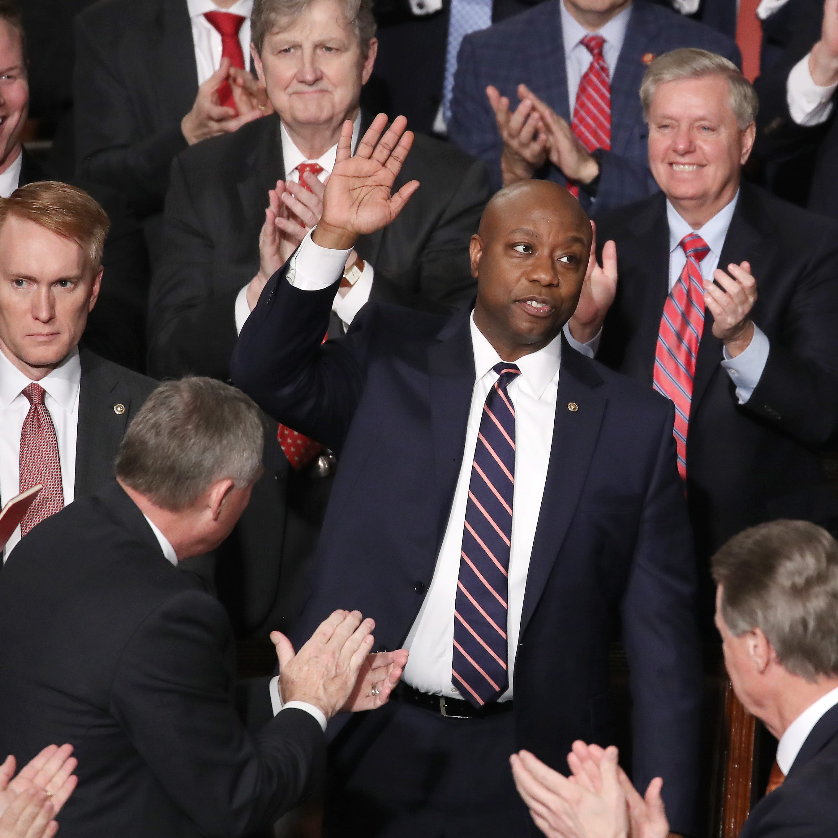 Sen. Tim Scott, R-S.C., acknowledges applause during the State of the Union address in the chamber of the U.S. House of Representatives on Feb. 4, 2020 in Washington.