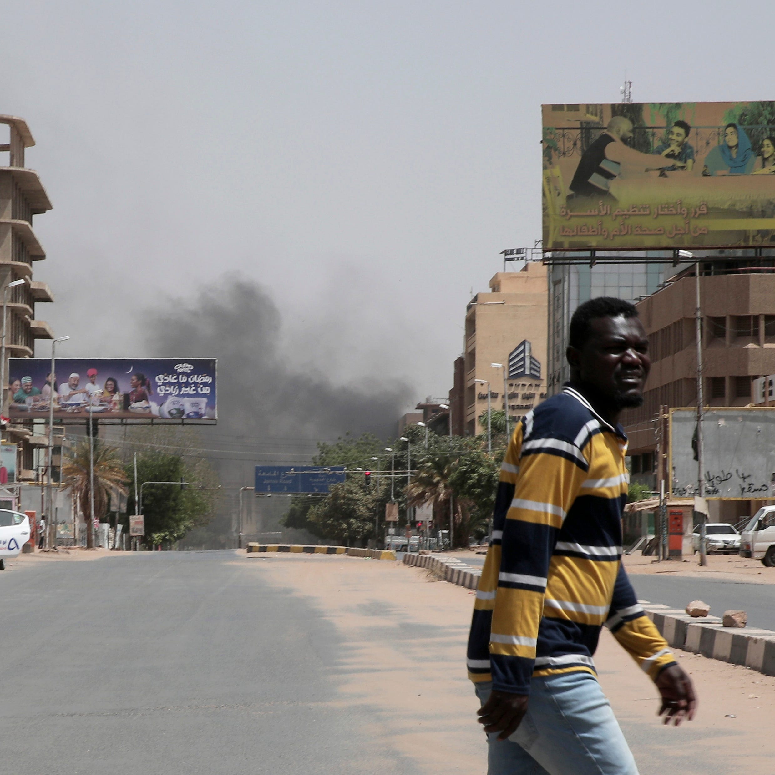 Smoke is seen rising from a neighborhood in Khartoum, Sudan, Saturday, April 15, 2023. (AP Photo/Marwan Ali)