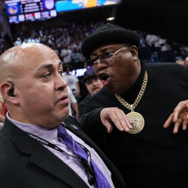 Who is this sitting with e-40 at the warriors game? : r/warriors