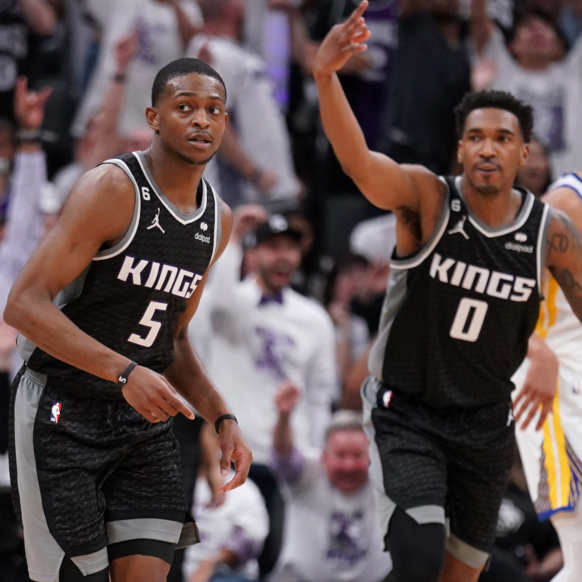 Guard Malik Monk (0) and guard De'Aaron Fox (5) propelled the Sacramento Kings over the Golden State Warriors in Game 1 of their playoff series.