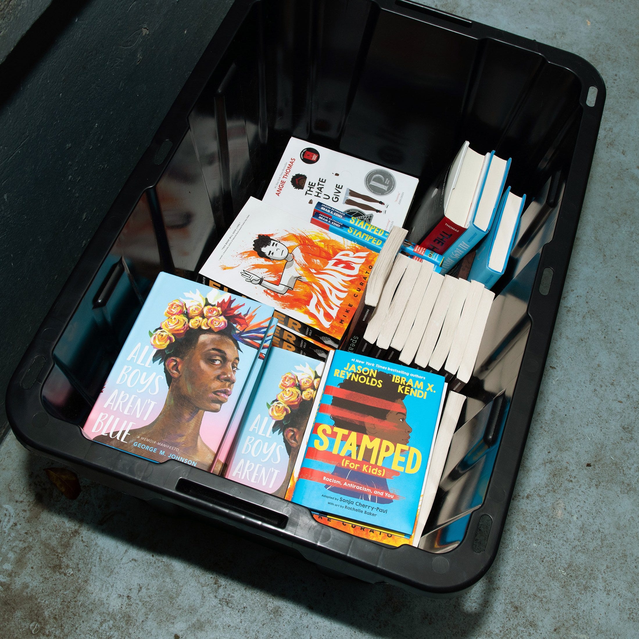 Books that are among a ban list at a rally in Tallahassee, Fla. on March 21, 2023. As book bans climb across the United States, Florida has become a hot spot, with laws that restrict books across the state. (Agnes Lopez/The New York Times)