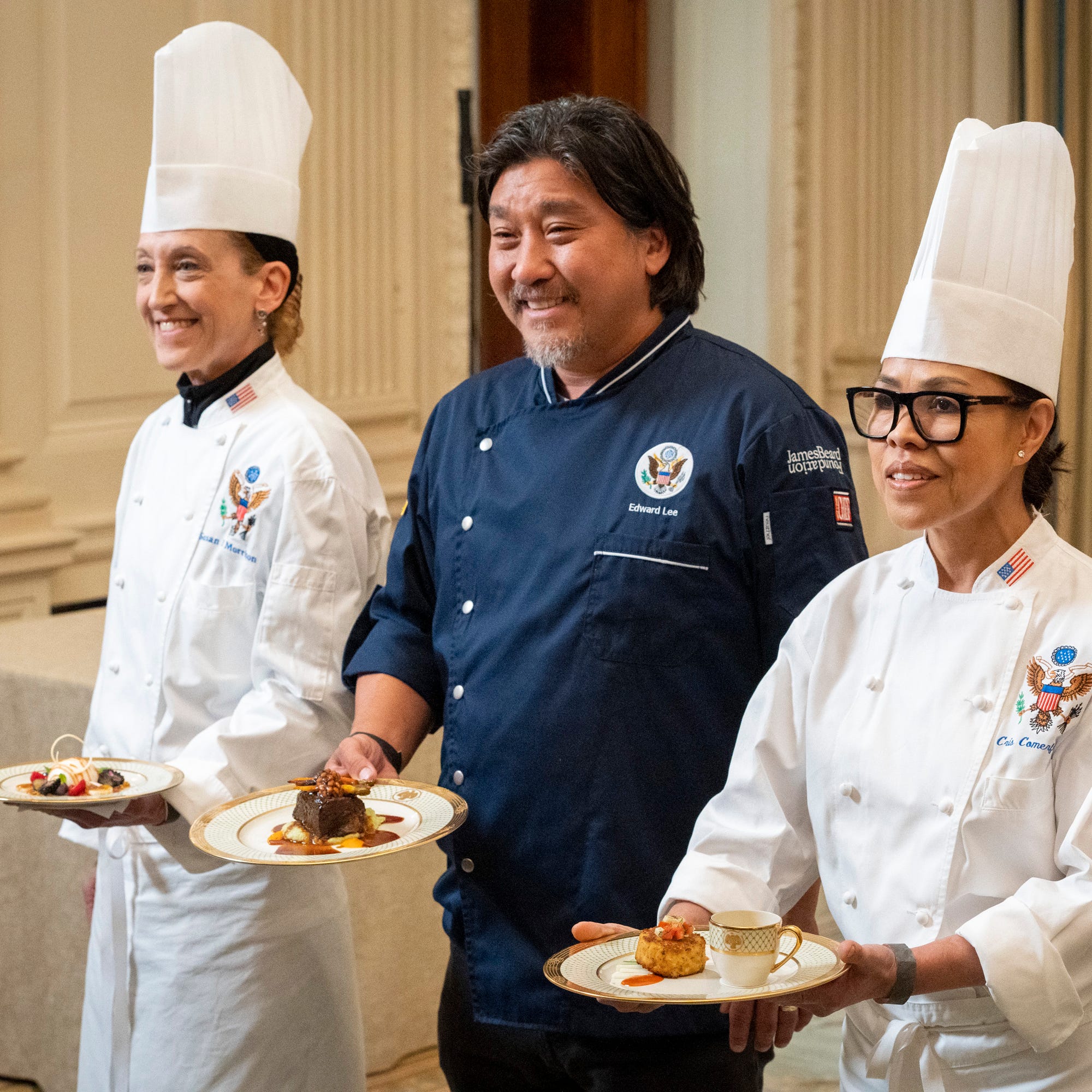 Apr 24, 2023; Washington, DC., USA; April 24, 2023; Washington, D.C. USA -- White House Executive Pastry Chef Susie Morrison (left), guest Chef Edward Lee (center) and White House Executive Chef?Cris?Comerford (right) present their dishes as first lady Jill Biden hosts a preview of the State Dinner being held to honor South Korean President Yoon Suk-Yeol on April 24, 2023. The dinner will take place on April 26.. Mandatory Credit: Jasper Colt-USA TODAY ORG XMIT: USAT-709269 (Via OlyDrop)