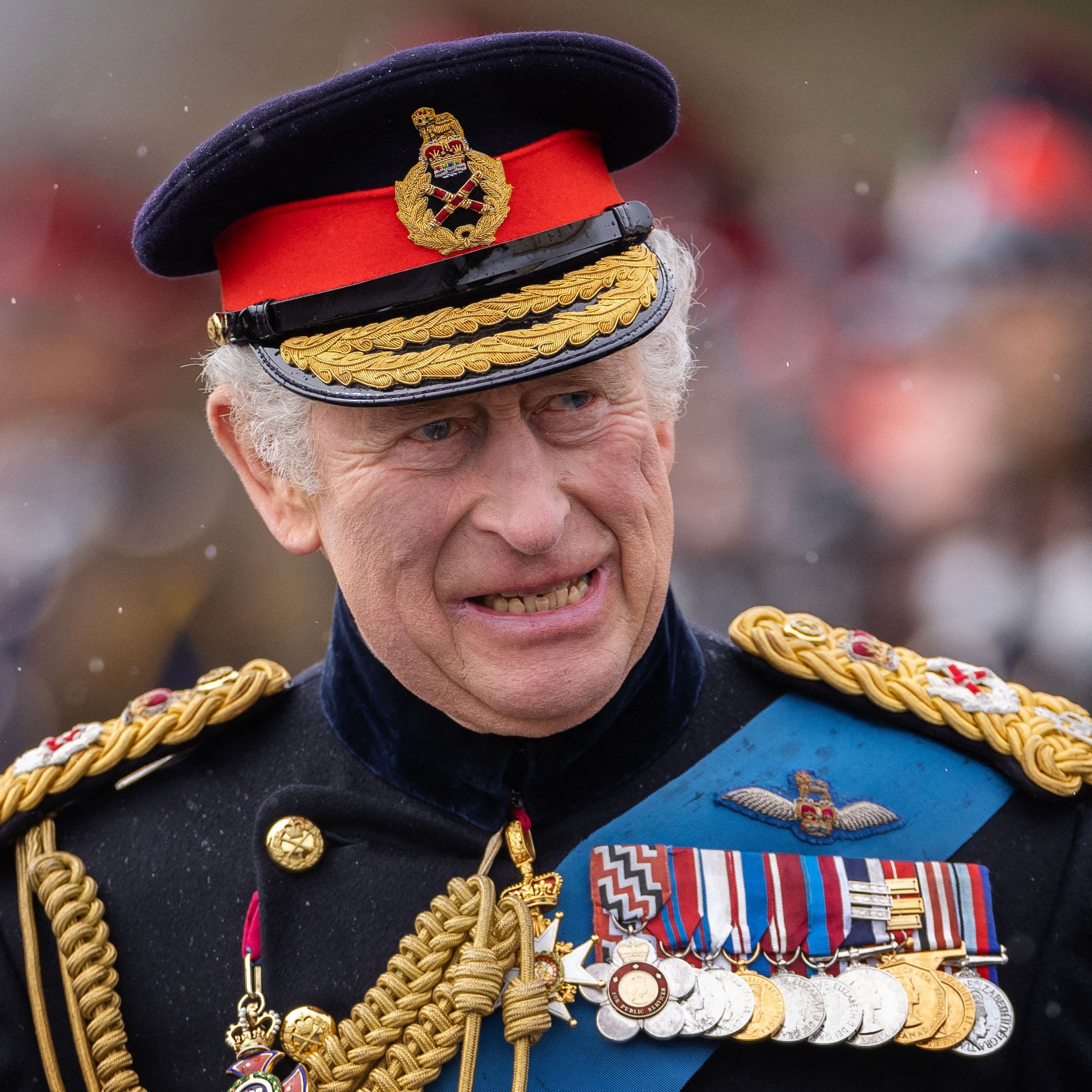 Britain's King Charles III inspects graduating officer cadets march during the 200th Sovereign's Parade at the Royal Military Academy, Sandhurst, southwest of London on April 14, 2023. (Photo by Dan Kitwood / POOL / AFP) (Photo by DAN KITWOOD/POOL/AFP via Getty Images) ORG XMIT: 775965145 ORIG FILE ID: AFP_33D82BQ.jpg