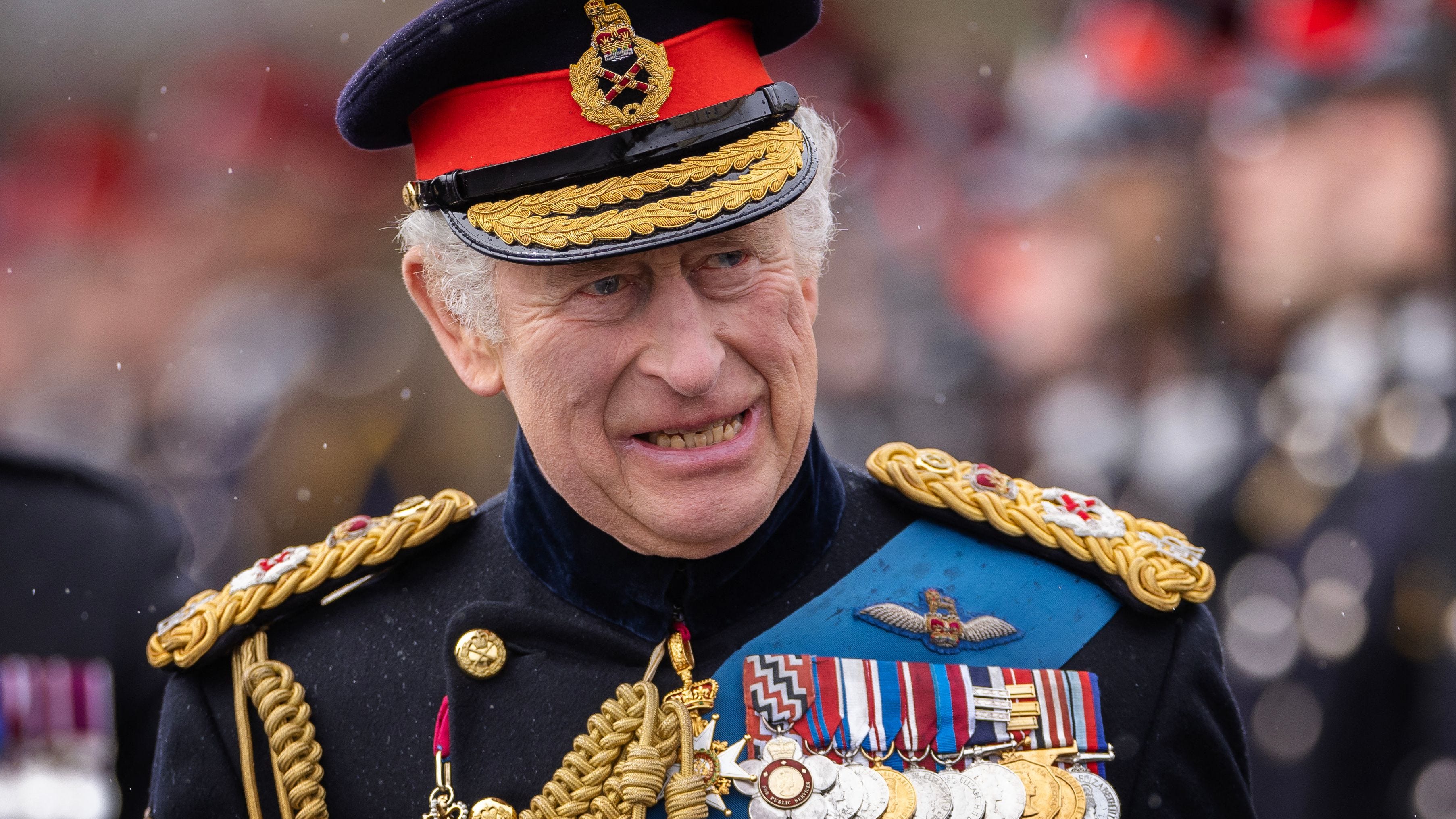 Britain's King Charles III inspects graduating officer cadets march during the 200th Sovereign's Parade at the Royal Military Academy, Sandhurst, southwest of London on April 14, 2023. (Photo by Dan Kitwood / POOL / AFP) (Photo by DAN KITWOOD/POOL/AFP via Getty Images) ORG XMIT: 775965145 ORIG FILE ID: AFP_33D82BQ.jpg