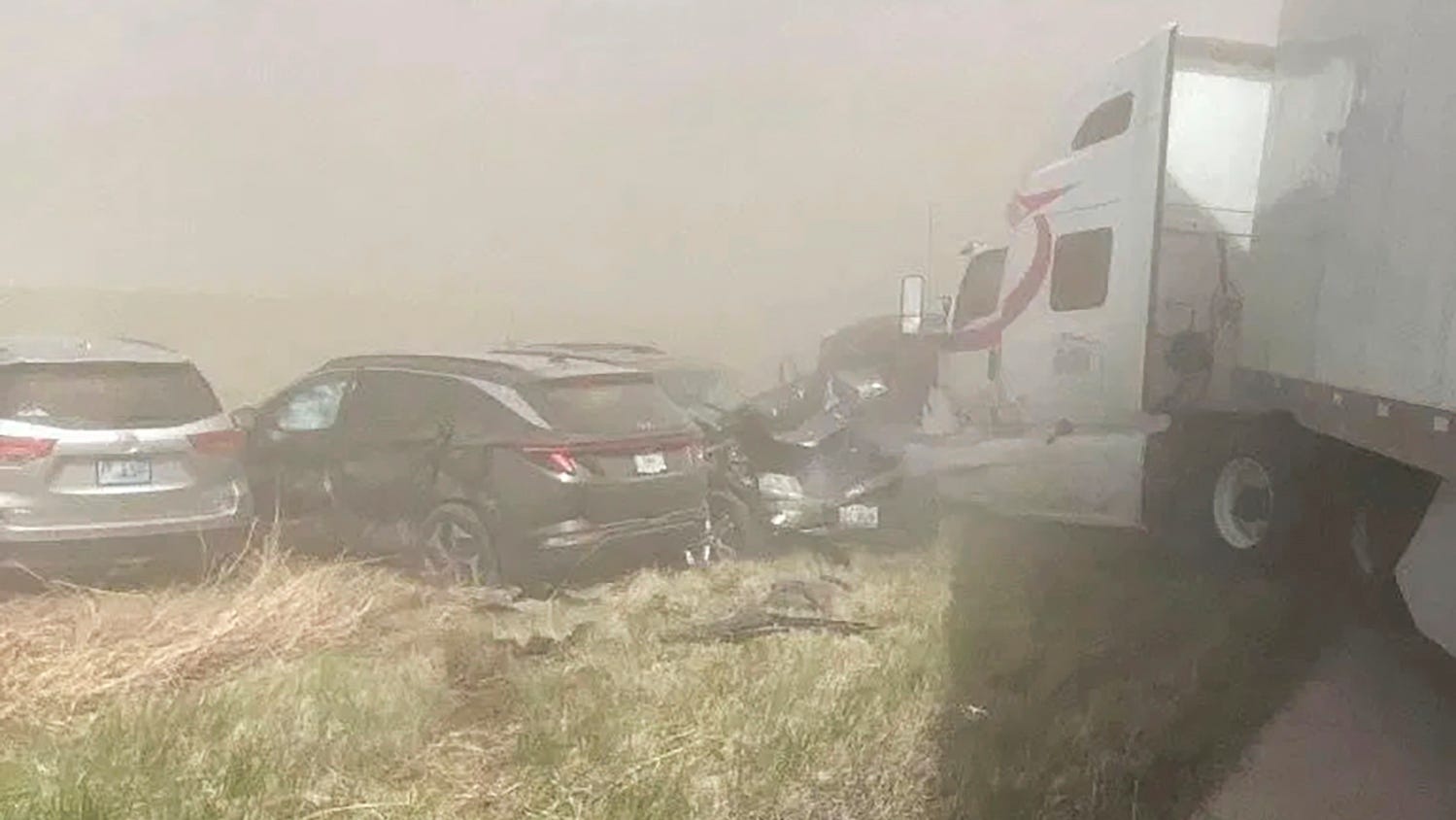 A crash involving at least 20 vehicles shut down a highway in Illinois, Monday, May 1, 2023. Illinois State Police say a windstorm that kicked up clouds of dust in south-central Illinois led to numerous crashes and multiple fatalities on Interstate 55.