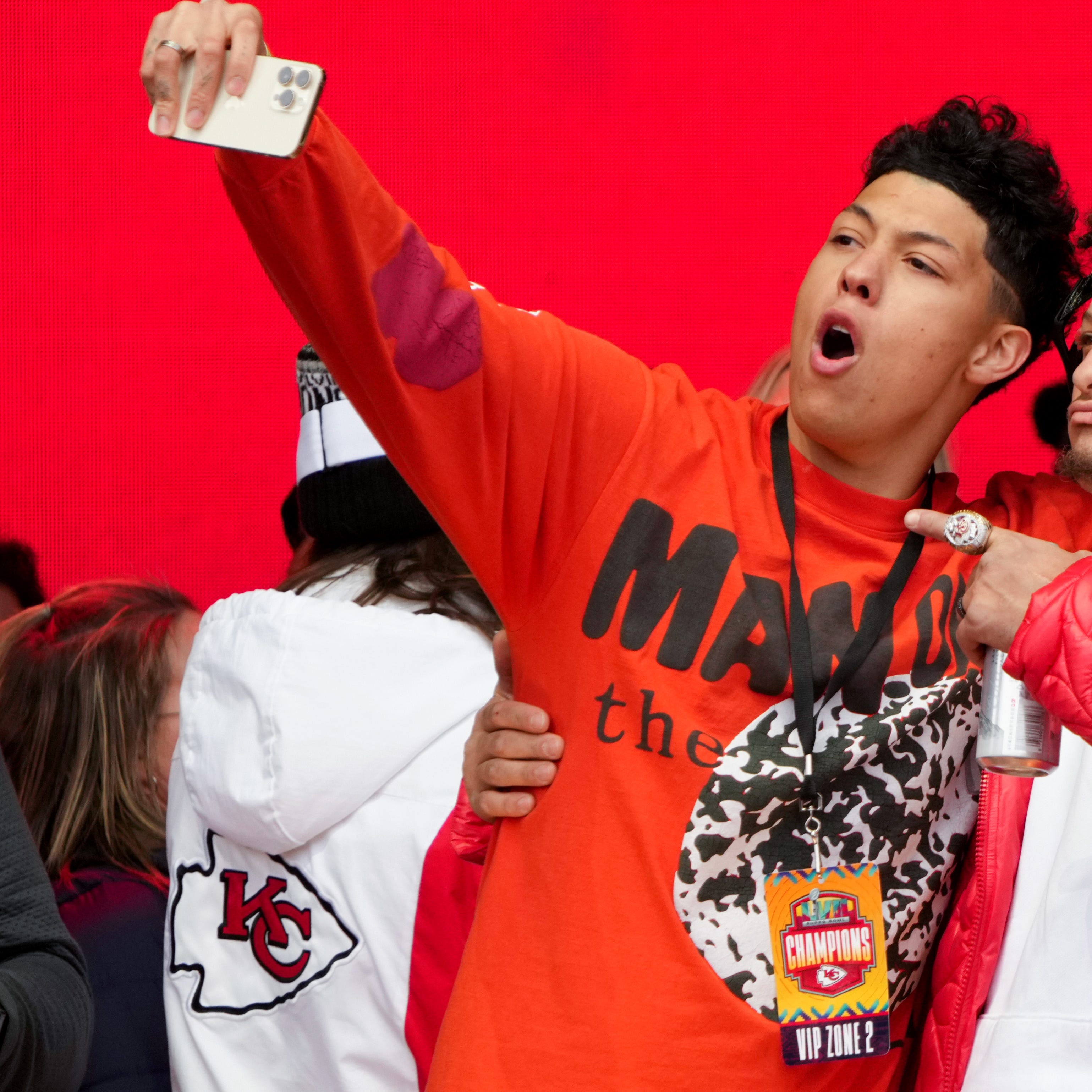 Jackson Mahomes celebrates on stage during the Kansas City Chiefs Super Bowl LVII victory parade on February 15, 2023 in Kansas City, Missouri.