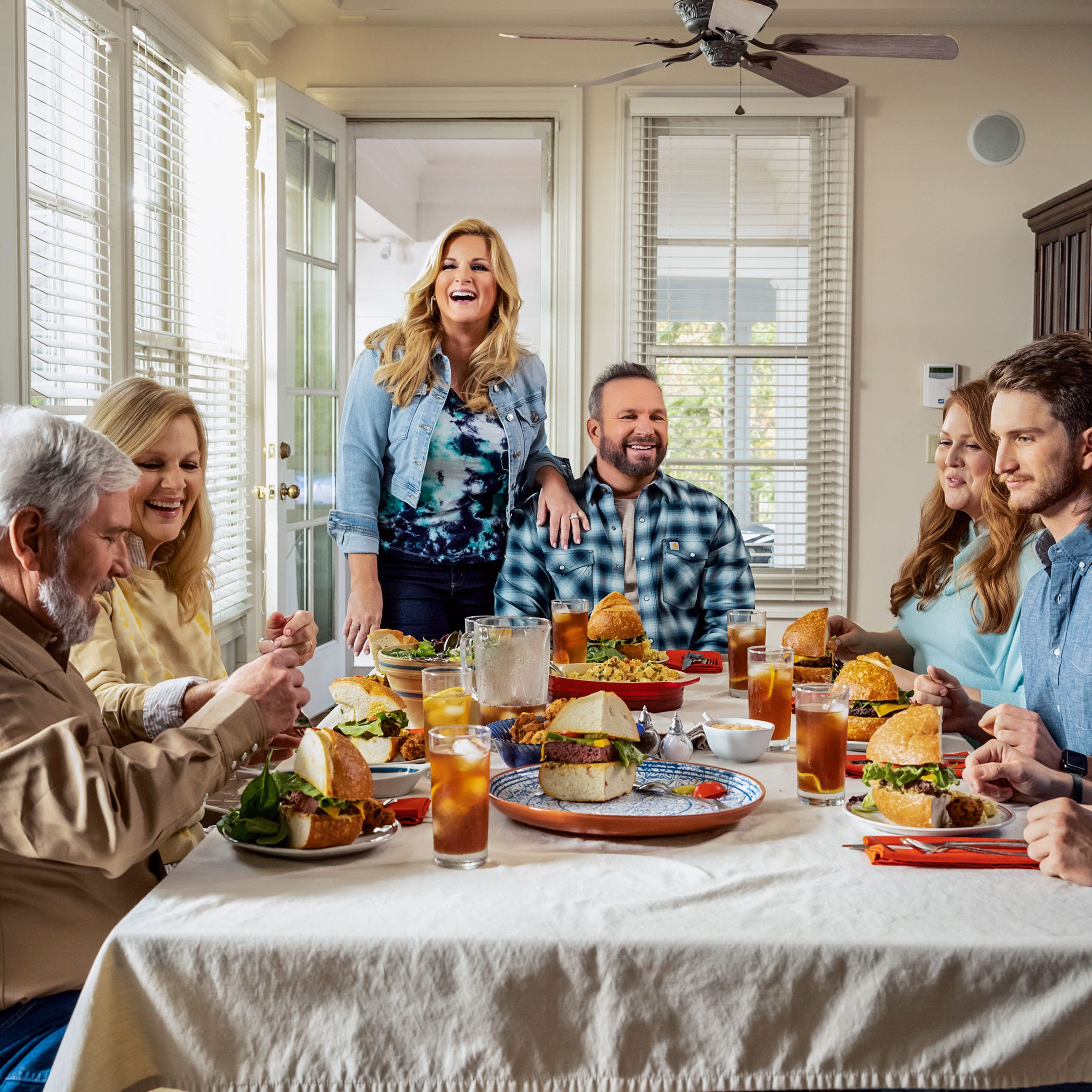 Trisha Yearwood, seen here with husband Garth Brooks and family, is selling her Brentwood home where this photo was taken.