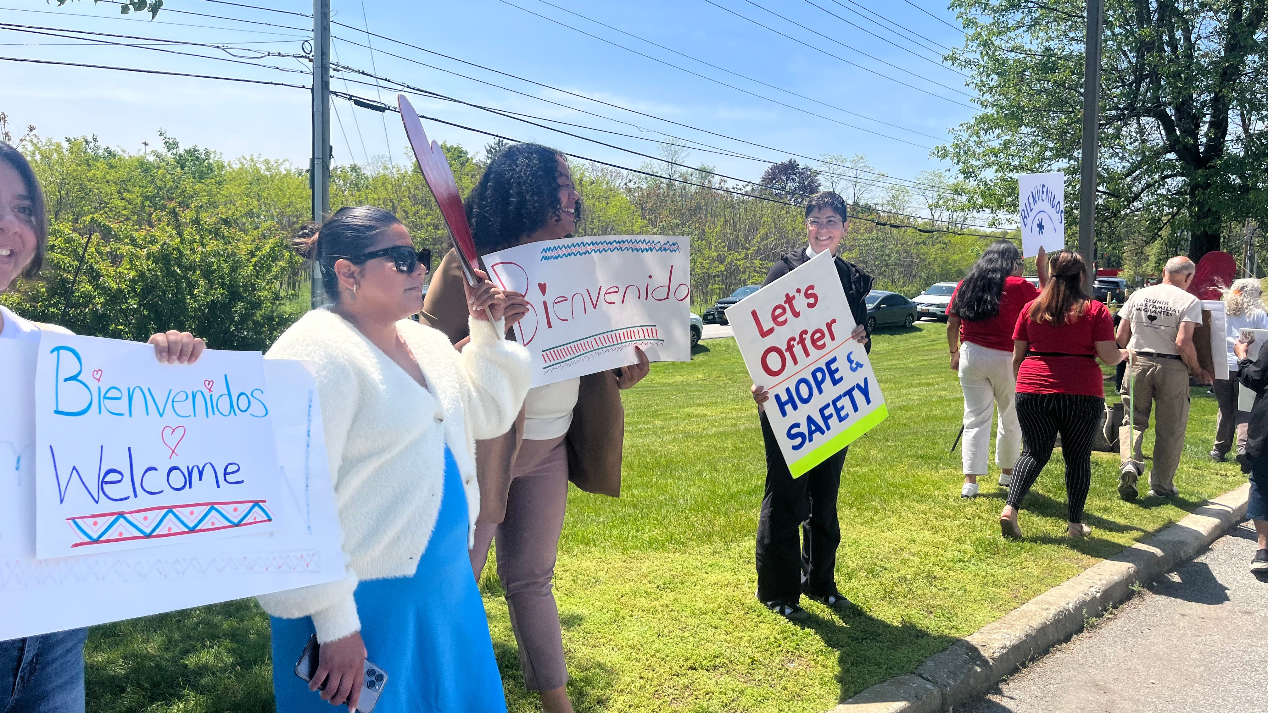 Members of grassroots organization For the Many and local elected officials greeted two buses of asylum seekers at Newburgh’s Crossroads Hotel on May 11, 2023. They were joined by other organizers, including those from the Workers Justice Center of New York and the New York Civil Liberties Union.