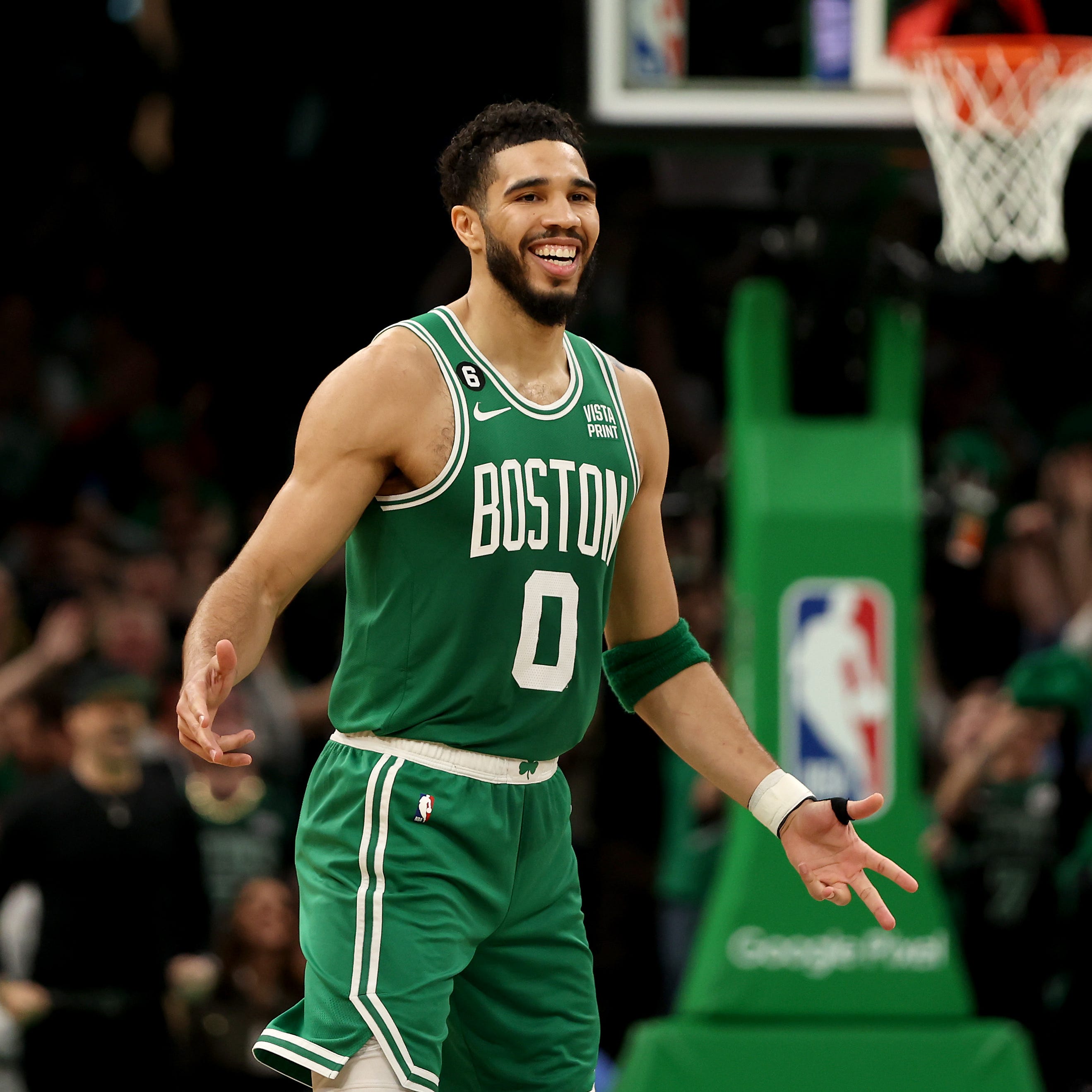 Jayson Tatum reacts to the crowd after scoring two of 51 points in Game 7 of the Eastern Conference semifinals.