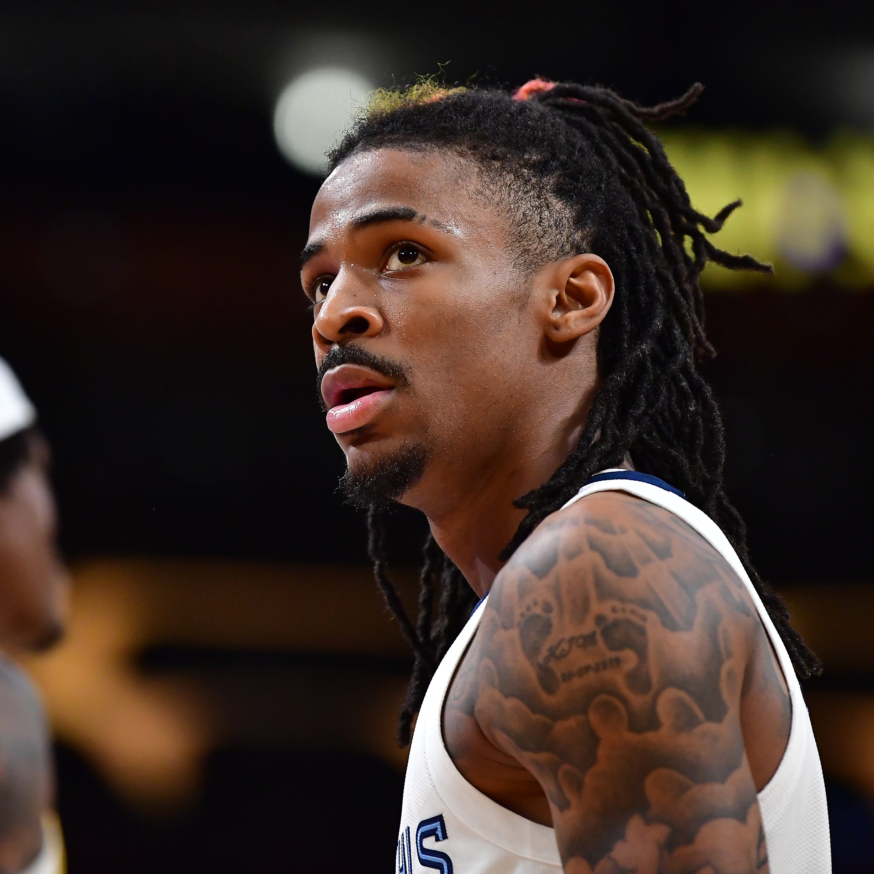 Grizzlies guard Ja Morant reacts during the first half of Game 4 of Memphis' 2023 playoff series against the Lakers in Crypto.com Arena in Los Angeles on April 24, 2023.