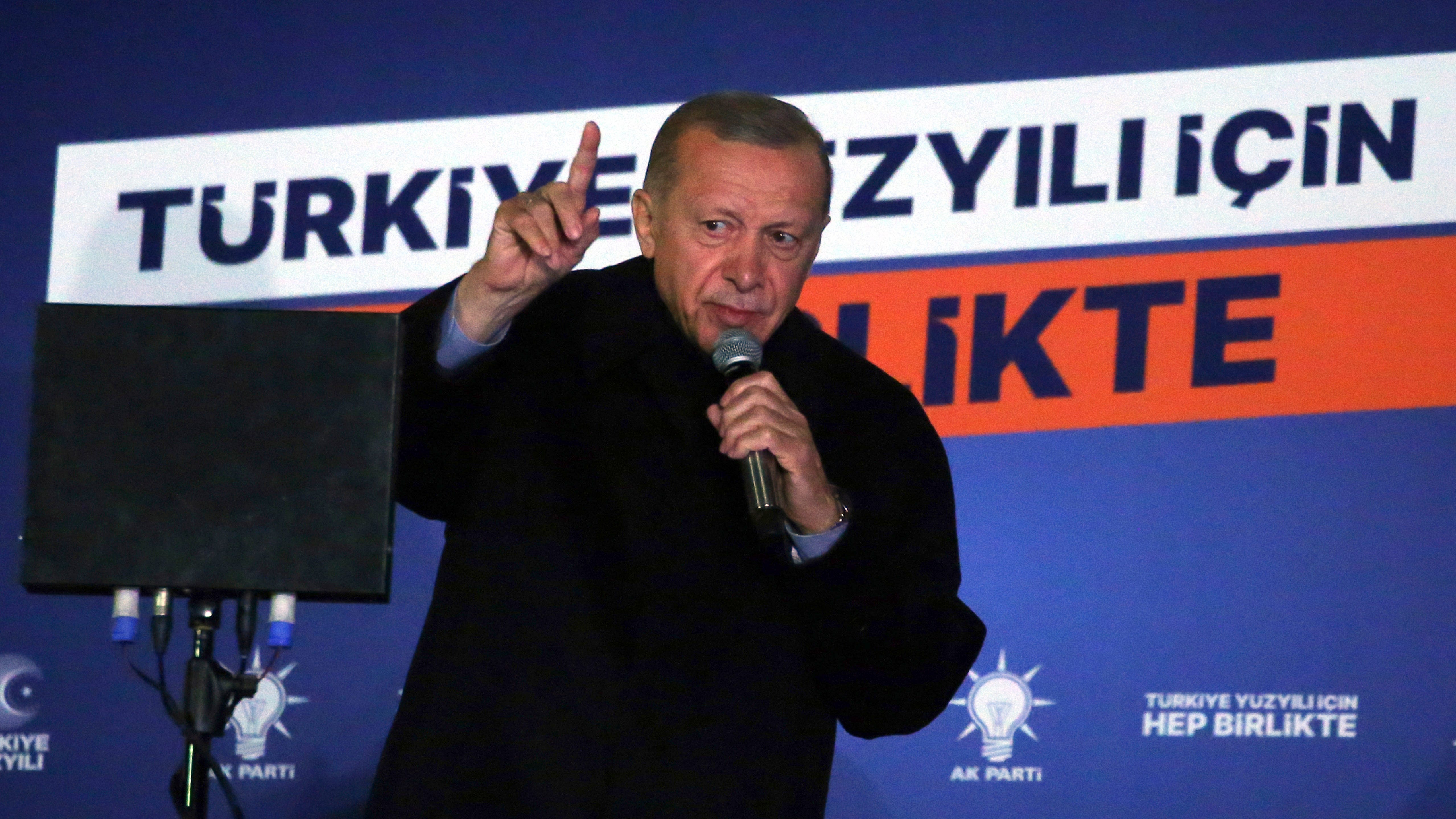 Turkish President Recep Tayyip Erdogan gives a speech at the party headquarters, in Ankara, Turkey, early Monday, May 15, 2023.