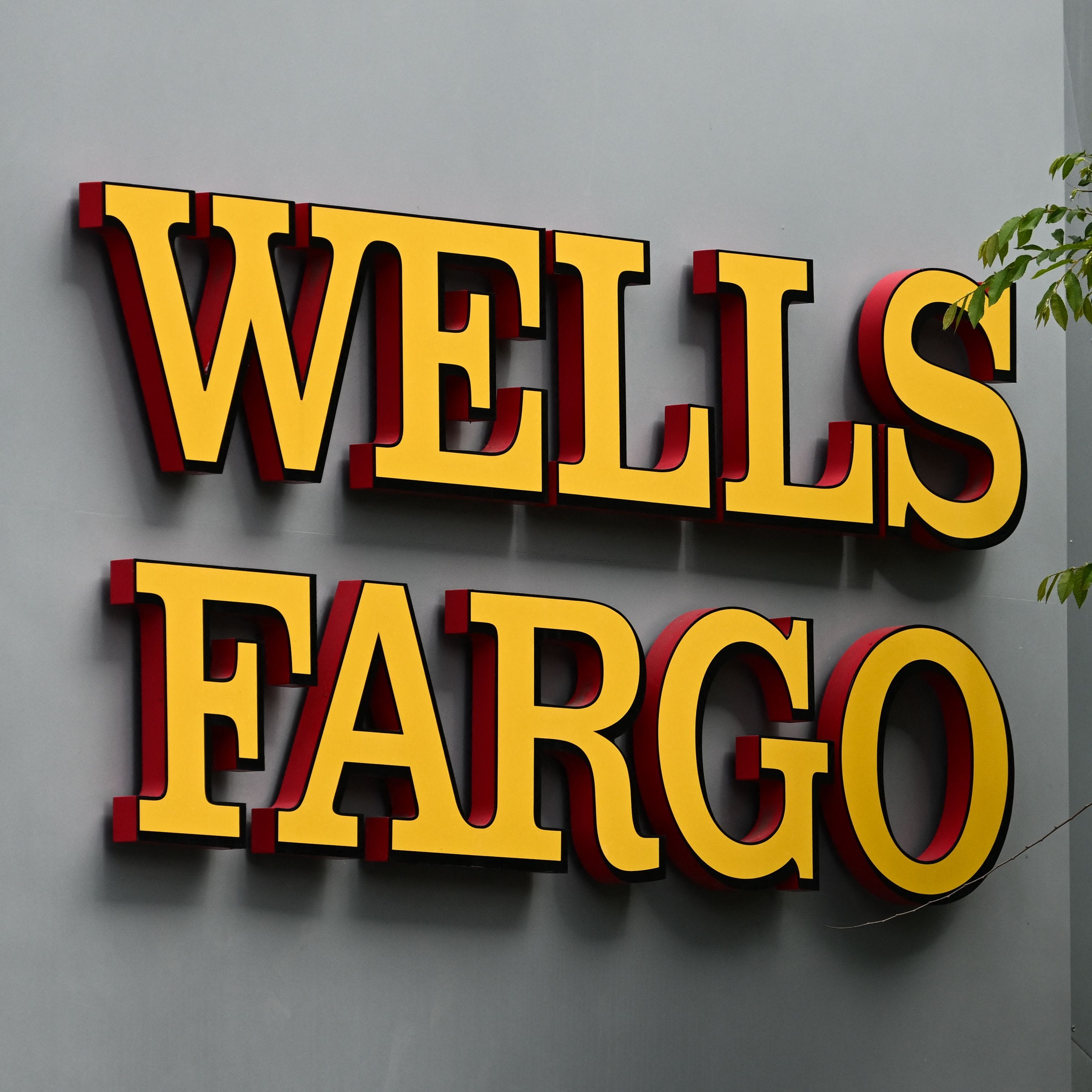 Wells Fargo & Co. bank signage is displayed outside of bank branch in Beverly Hills, California on May 4, 2023.