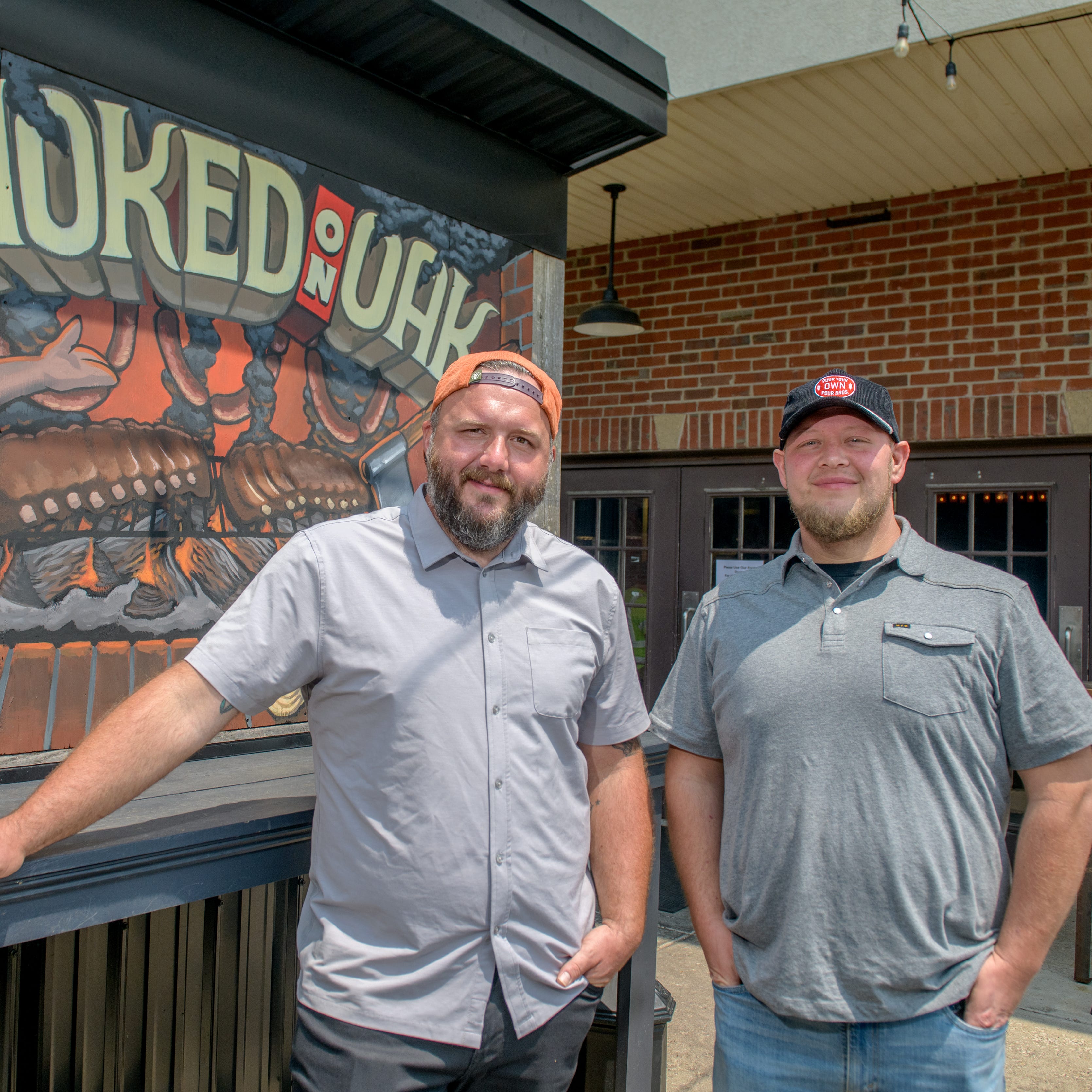 Noted chef Joshua Lanning, left, is joining co-owners Rob Mathisen, right, and Nathan Monroe as a partner at Slow Hand Craft BBQ in Peoria Heights.