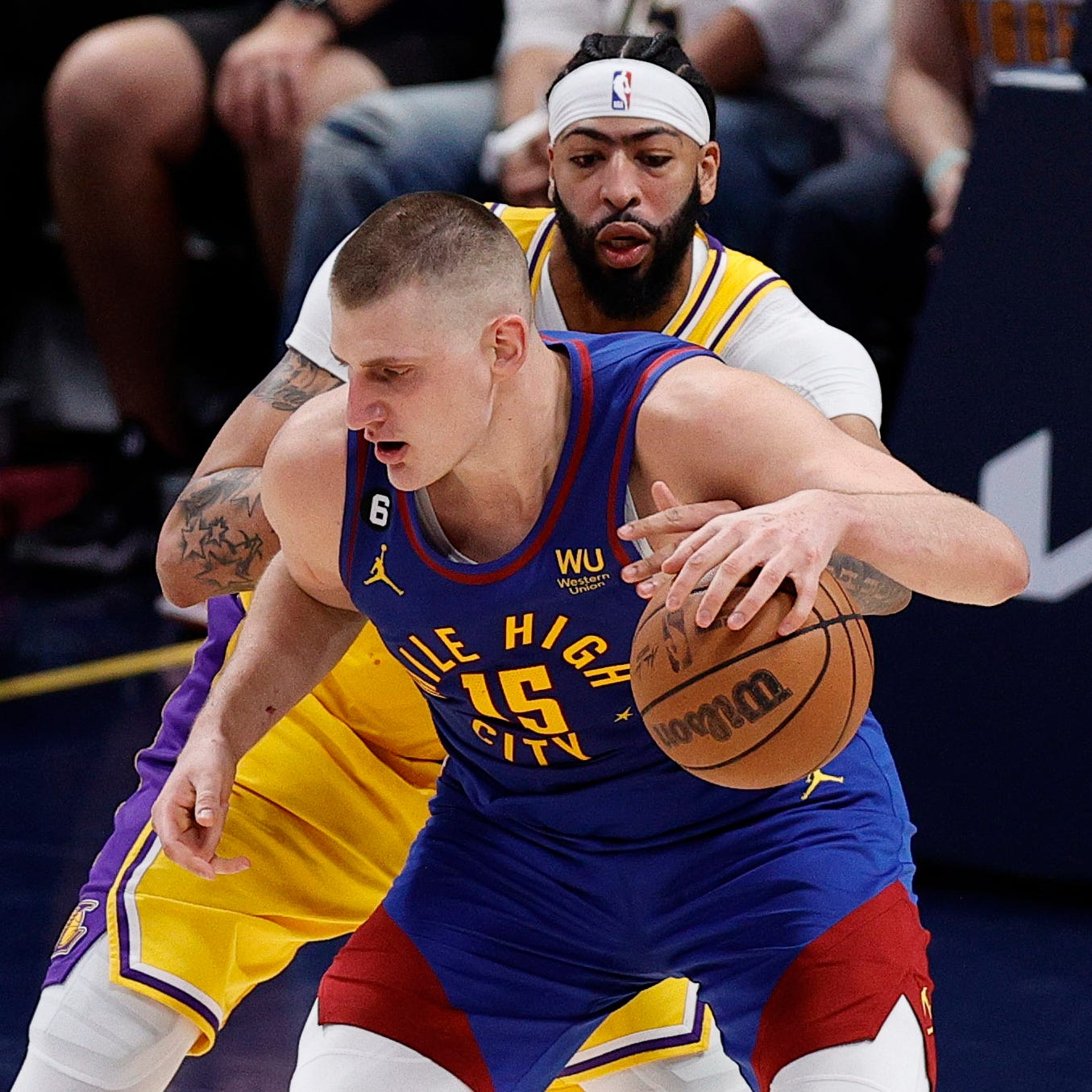 Lakers forward Anthony Davis defends Nuggets center Nikola Jokic in the third quarter of Game 1.